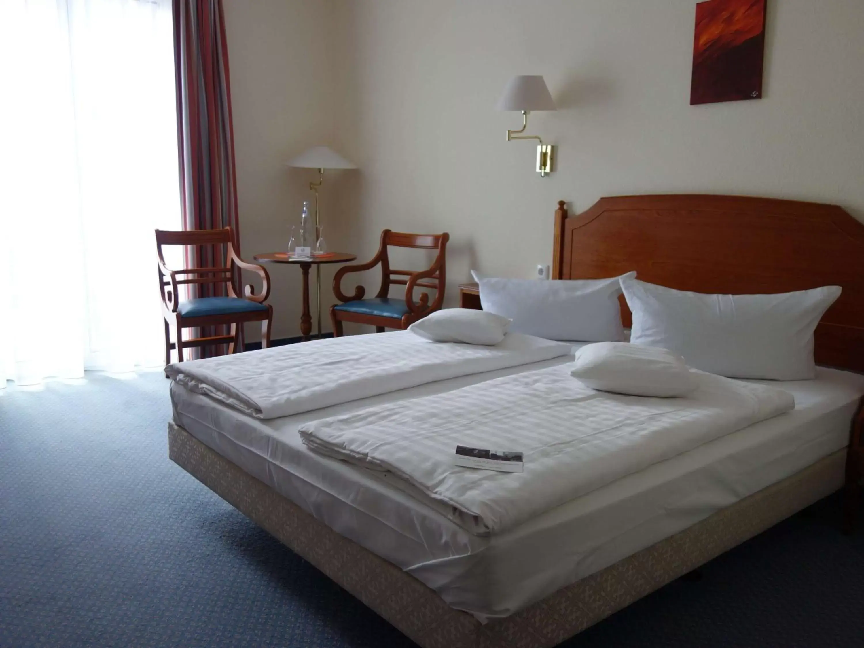 Photo of the whole room, Bed in Mercure Hotel Plaza Magdeburg