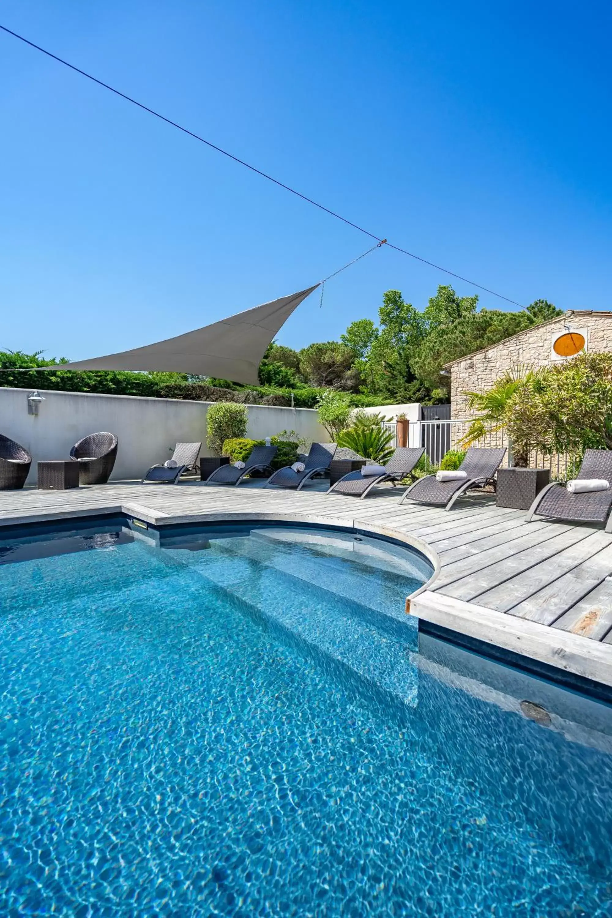 Swimming Pool in Elégance Suites Hôtel