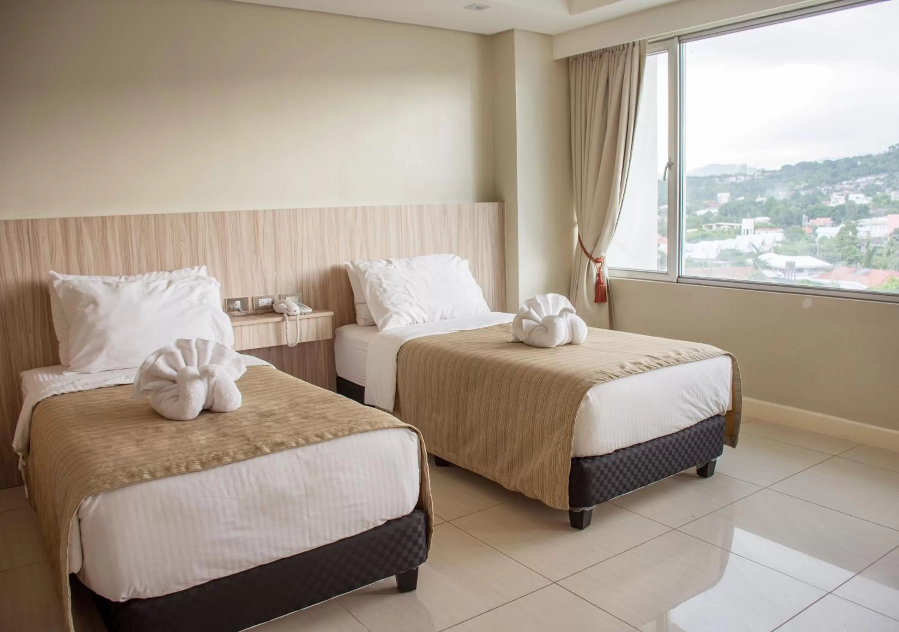 Bed in Alicia Apartelle