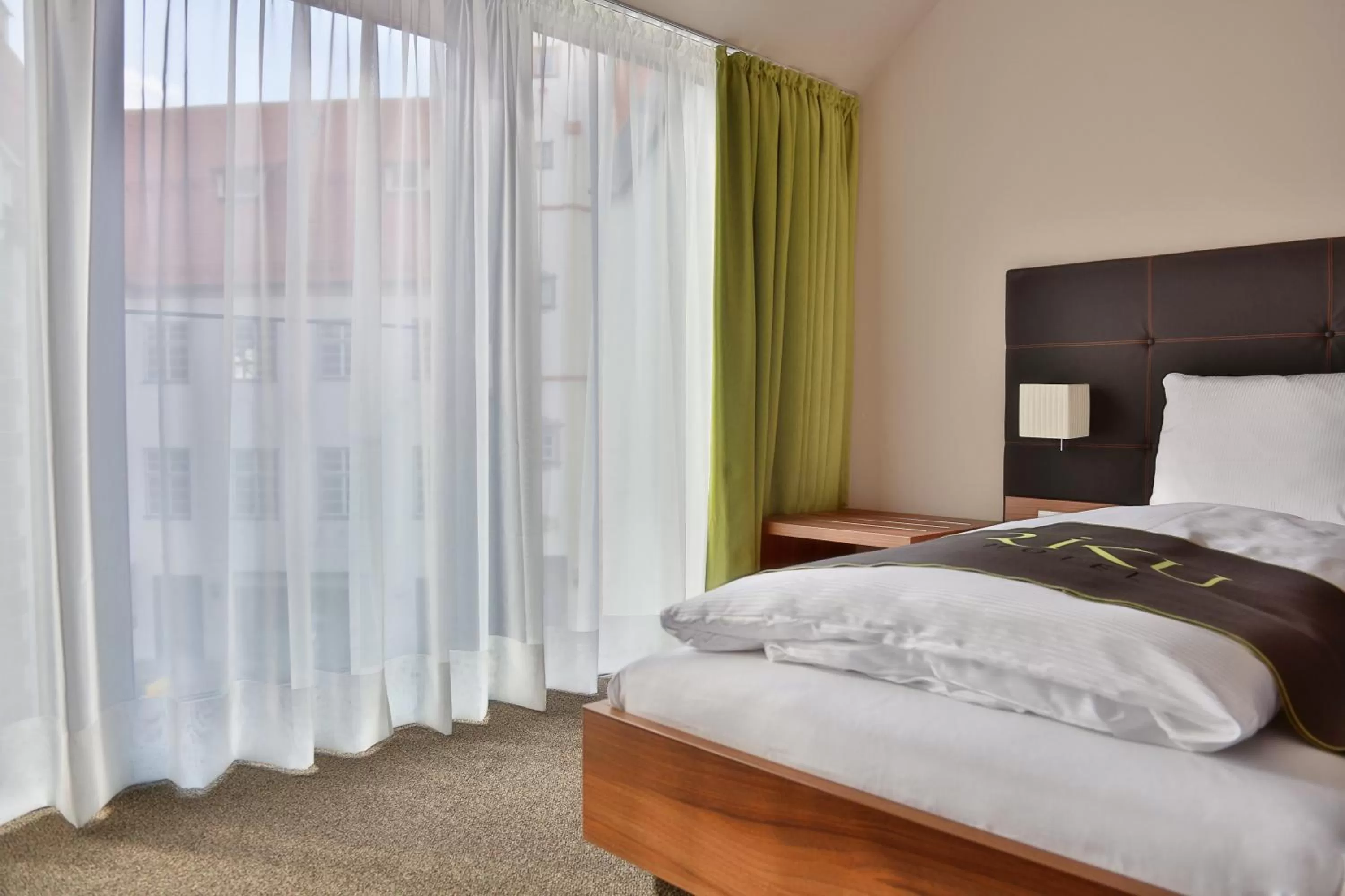 Day, Bed in RiKu HOTEL Weißenhorn