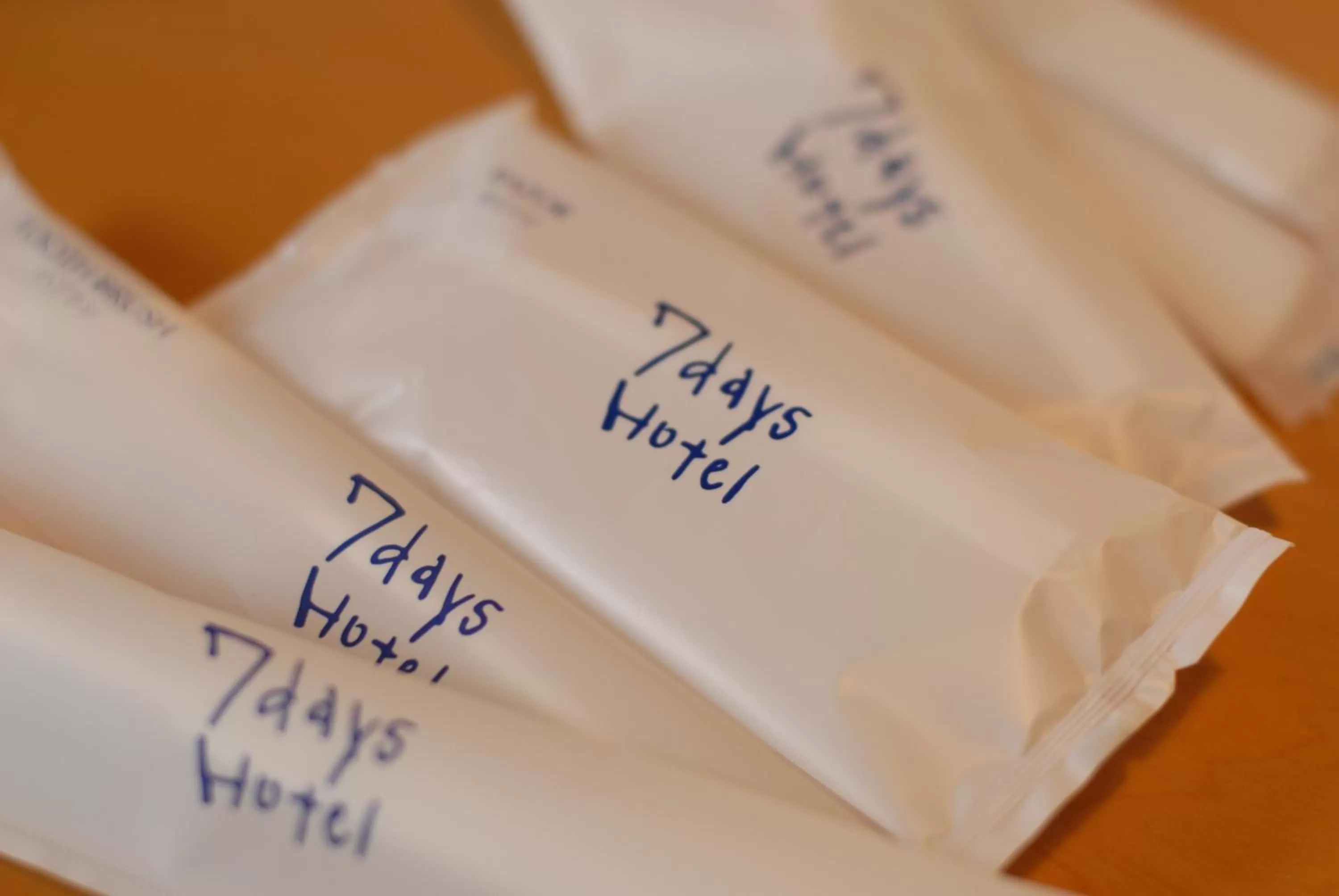 Property logo or sign in 7 Days Hotel