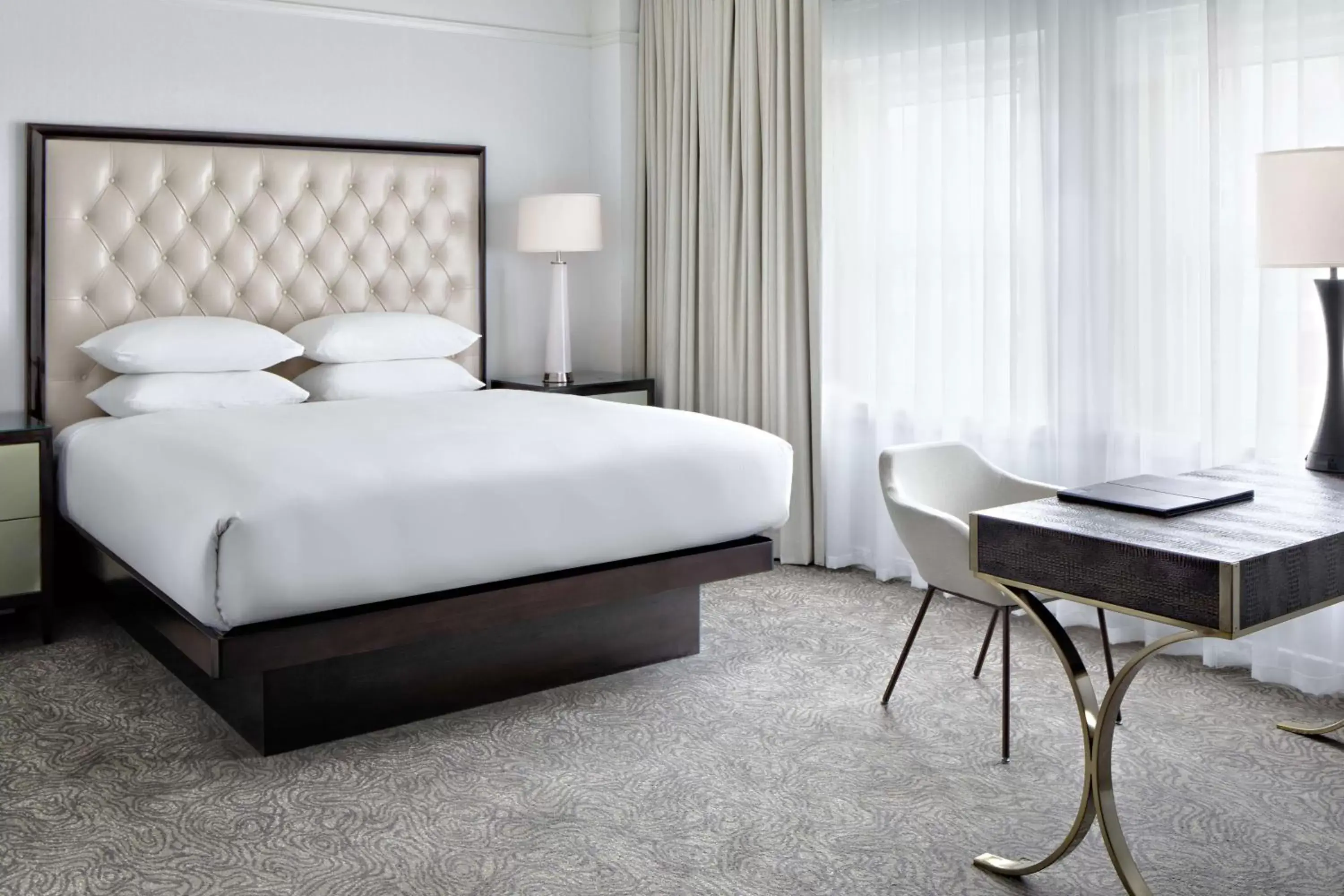 Bed in Amway Grand Plaza Hotel, Curio Collection by Hilton