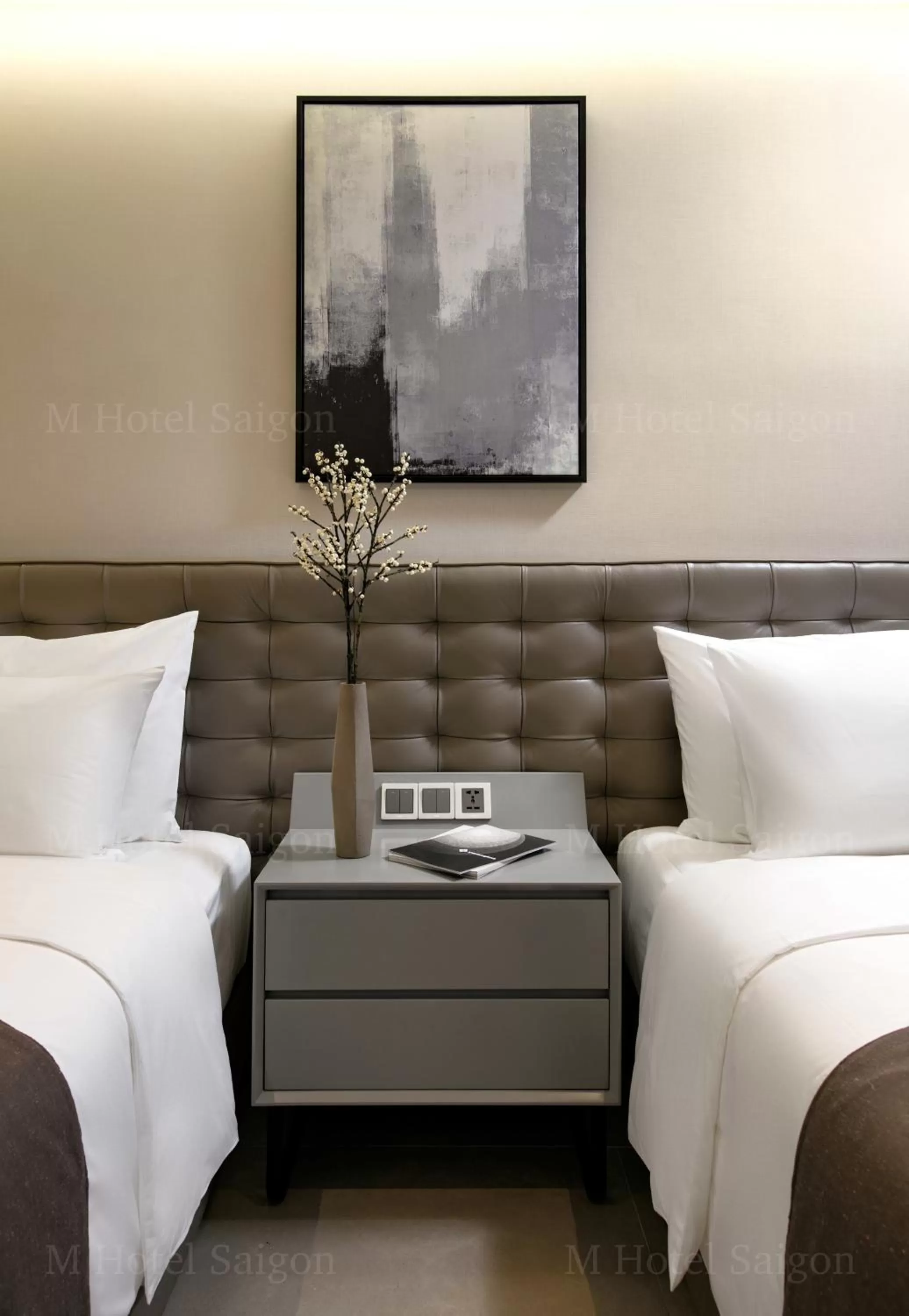 Bed in M Hotel Saigon