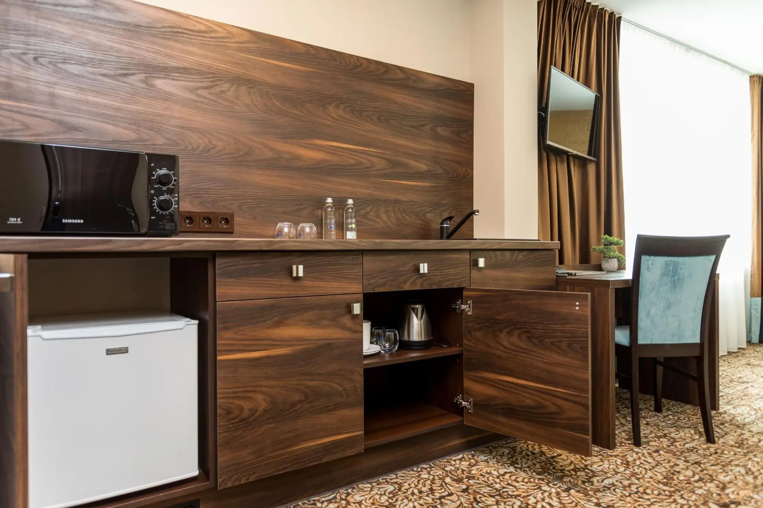 Coffee/tea facilities, TV/Entertainment Center in Gradiali Wellness and SPA