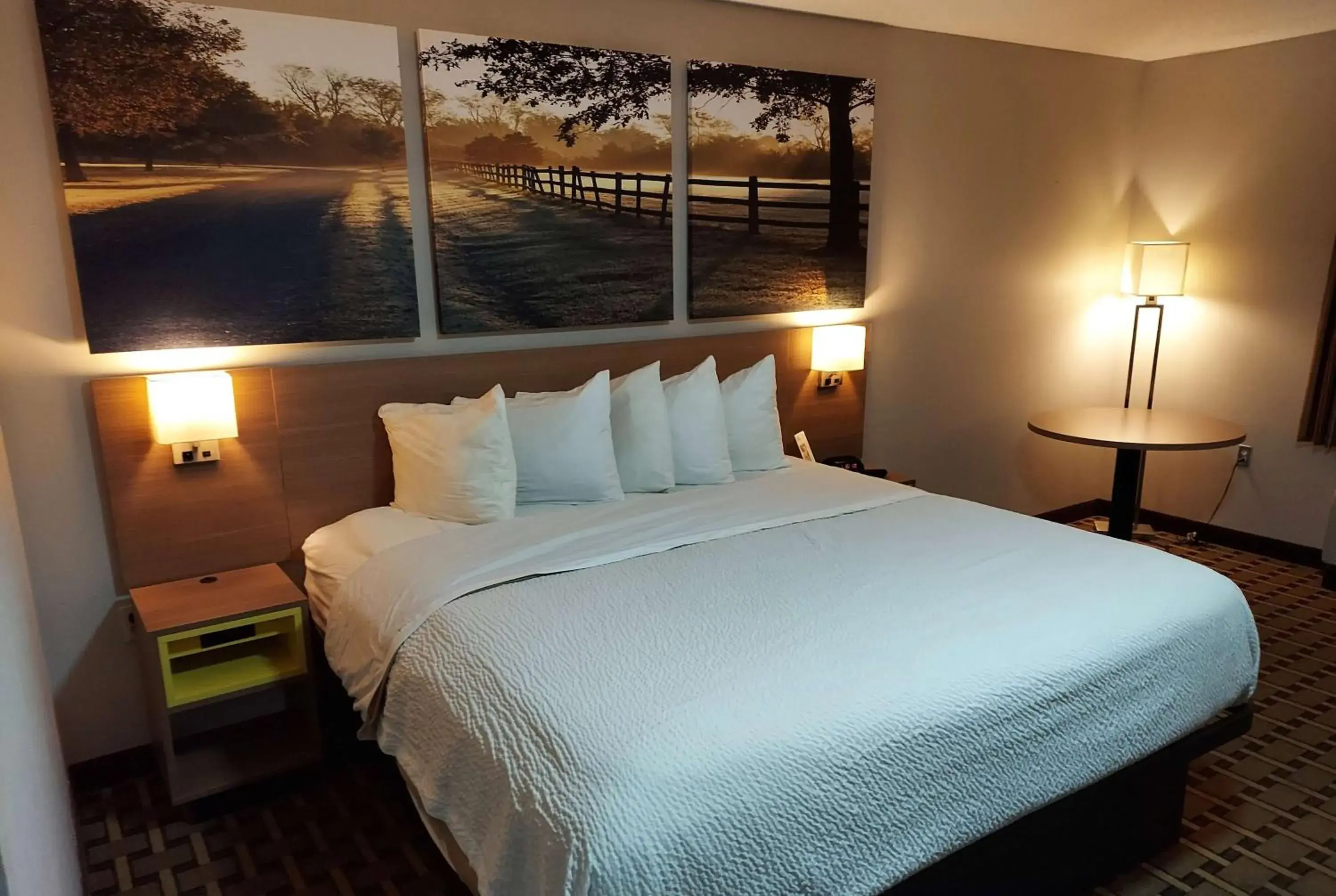 Photo of the whole room, Bed in Days Inn & Suites by Wyndham Huntsville