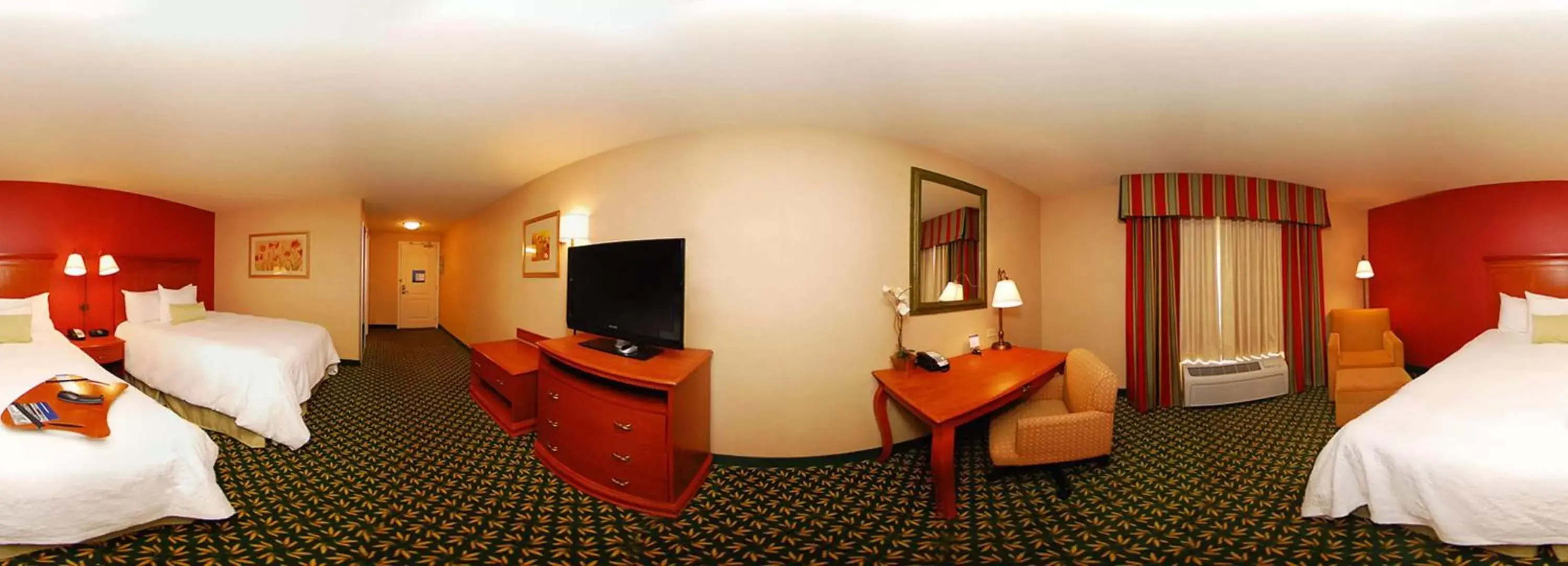 Bed, TV/Entertainment Center in Newly Renovated-Hampton Inn & Suites Casper