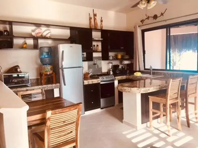 Kitchen/Kitchenette in Nah Uxibal Villa and Casitas