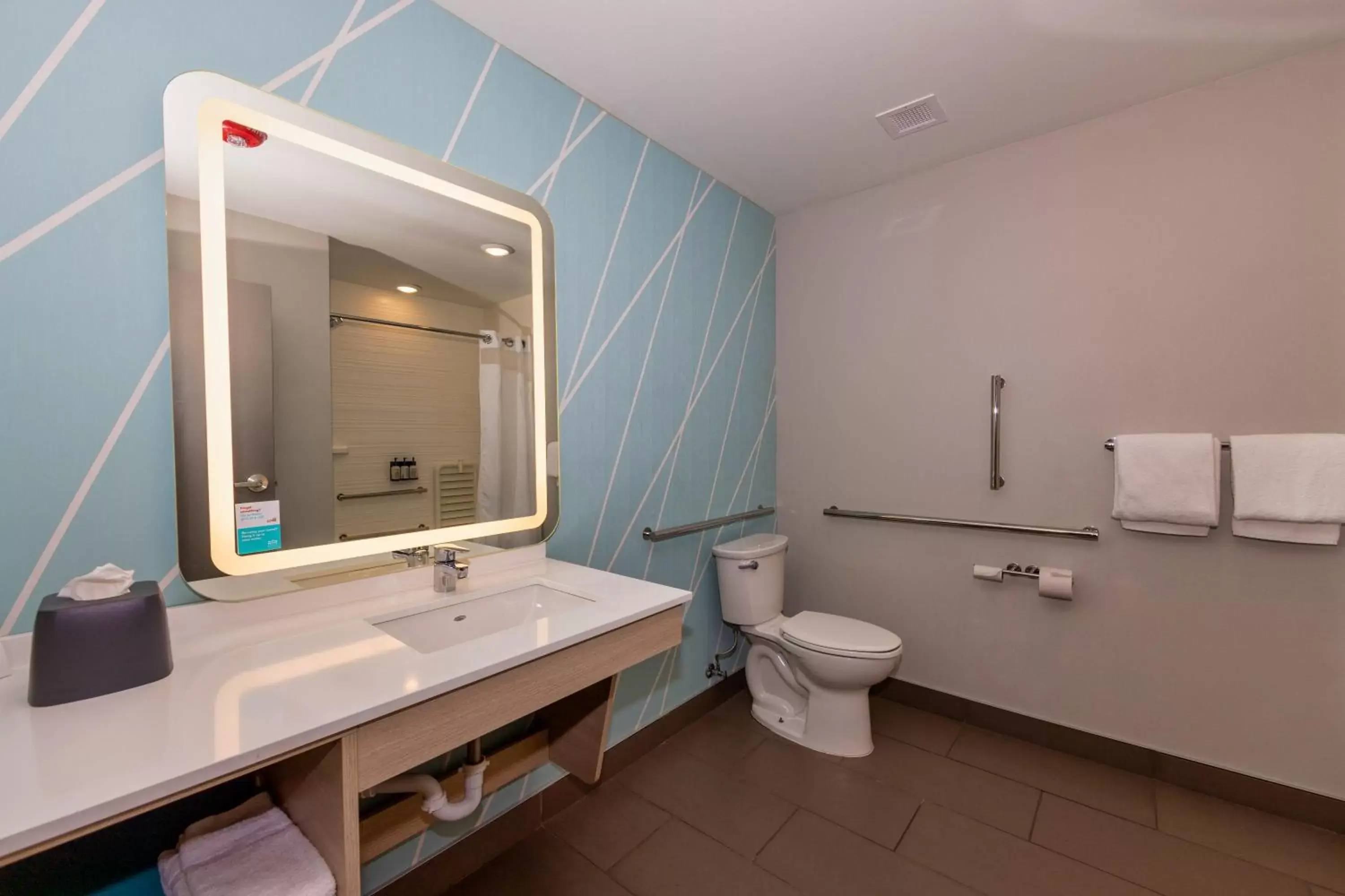 Bathroom in Avid Hotels - Denver Airport Area, an IHG Hotel