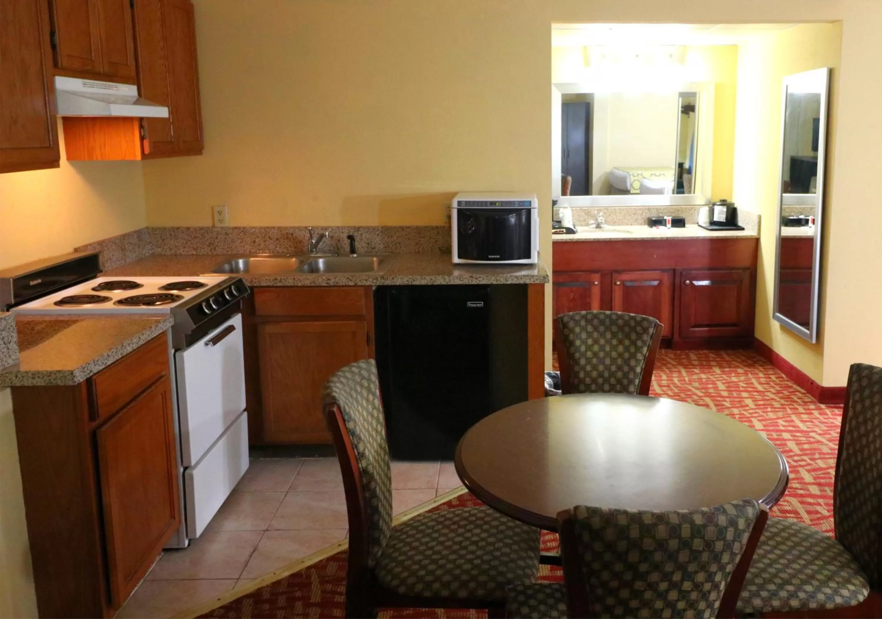 Kitchen or kitchenette in Baymont by Wyndham Sevierville Pigeon Forge