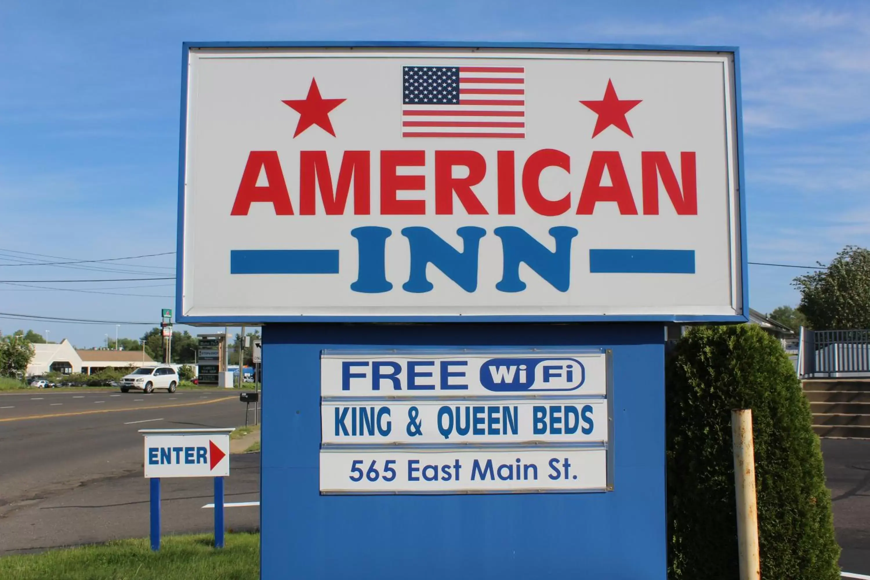 Property logo or sign in American Inn