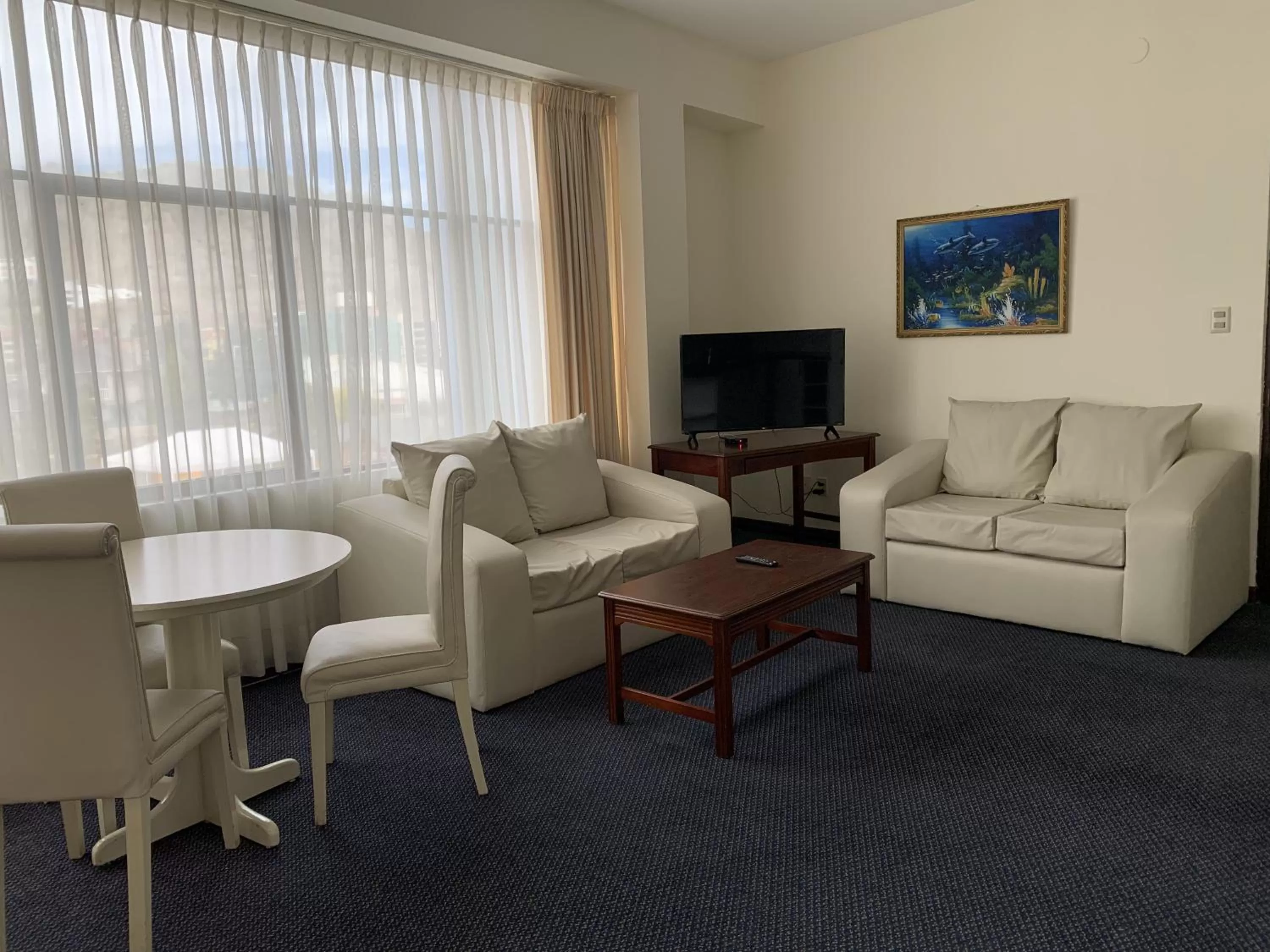 Living room in Delfines Apart Hotel