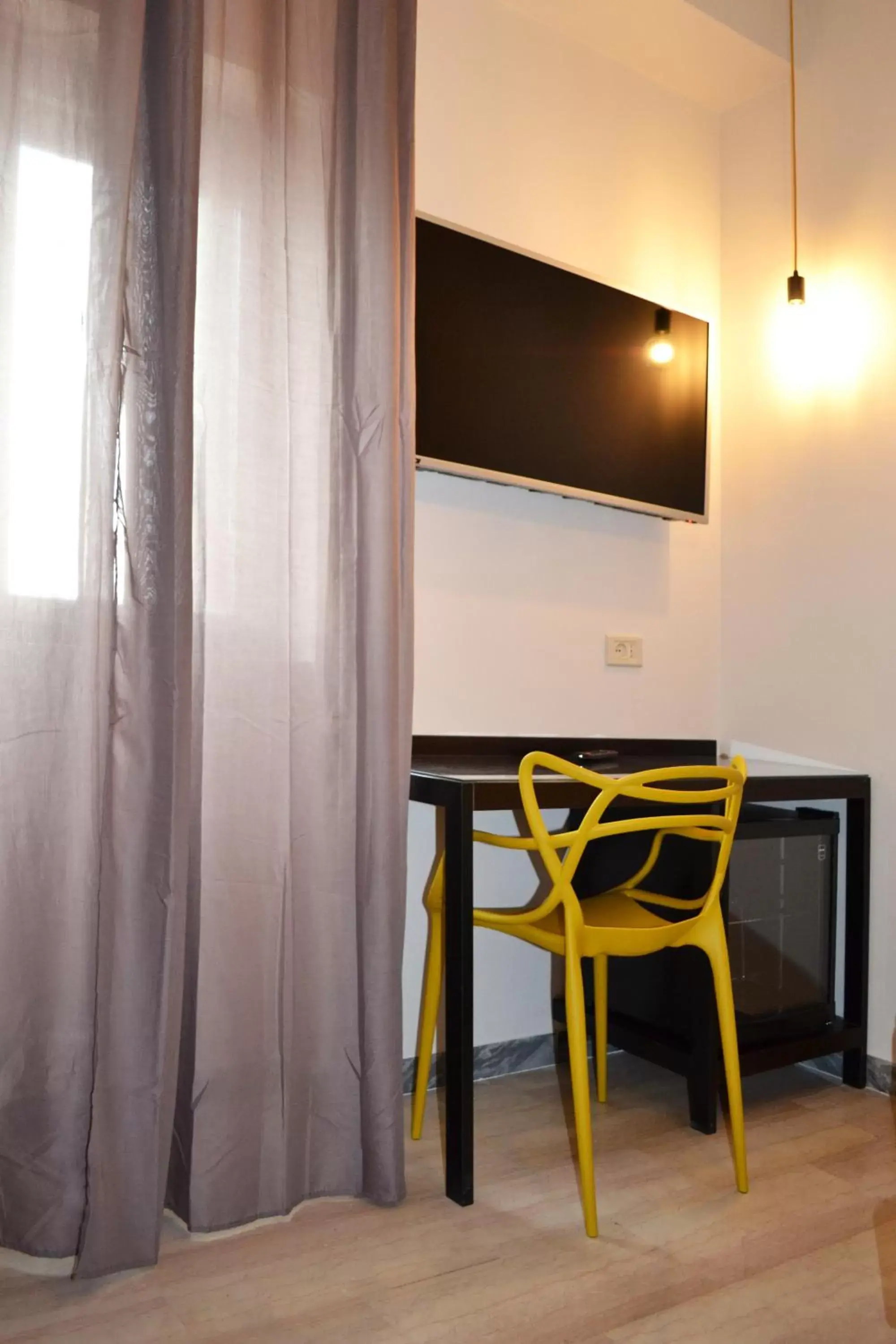 Photo of the whole room, TV/Entertainment Center in ibis styles Trani