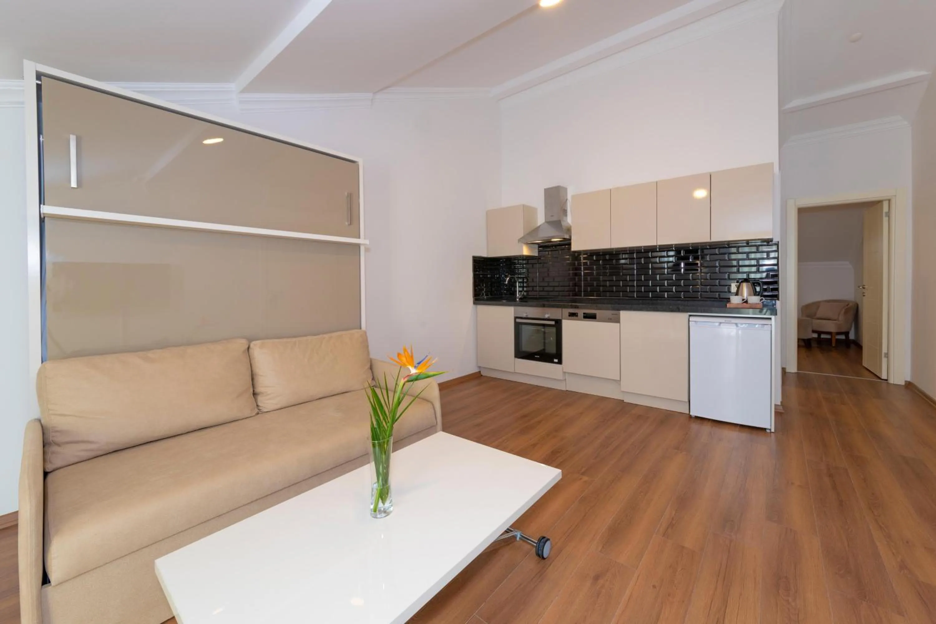 Kitchen or kitchenette in Joy Suites