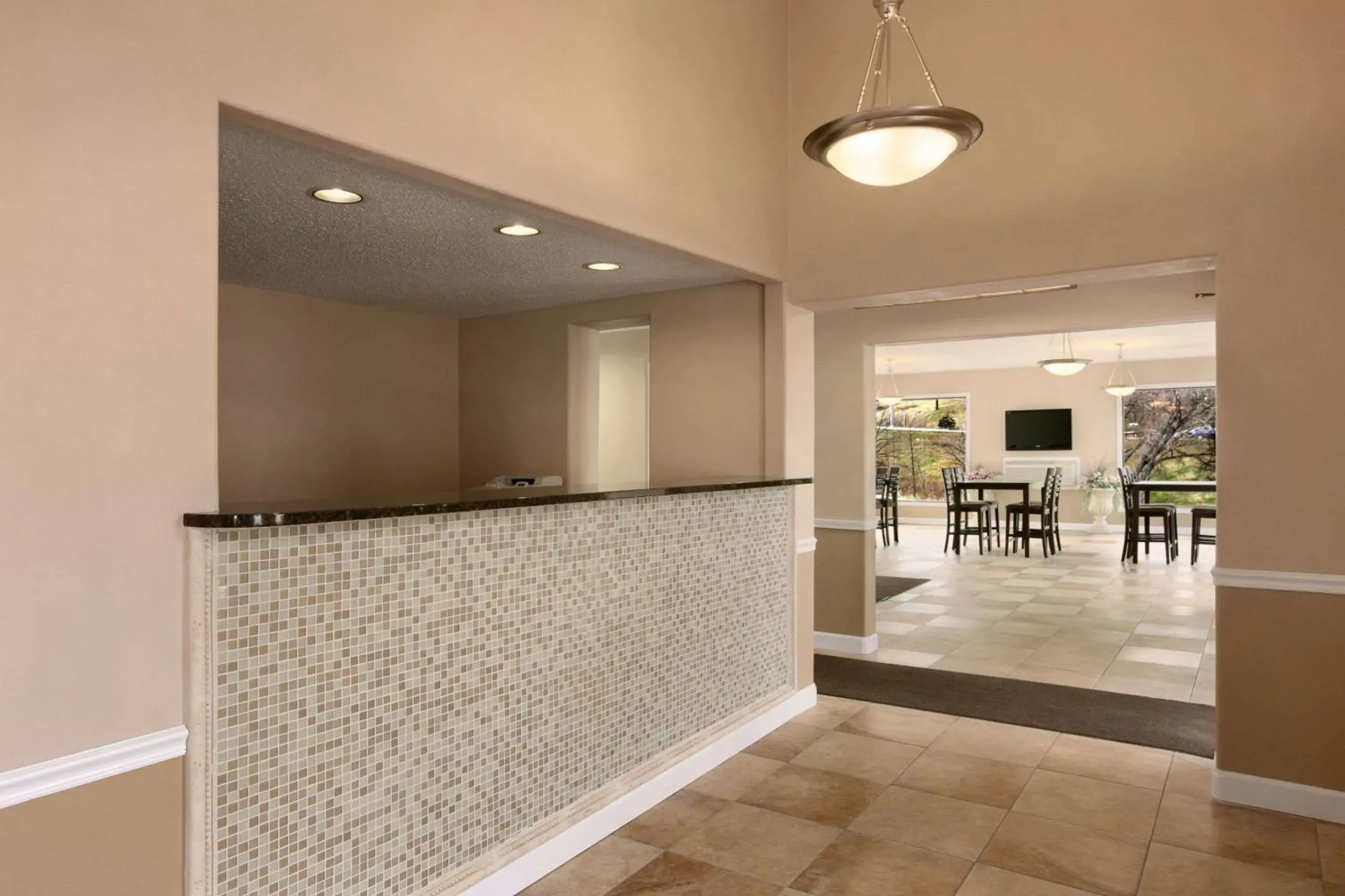 Lobby or reception in Super 8 by Wyndham Rapid City Rushmore Rd Lobby or reception in Super 8 by Wyndham Rapid City Rushmore Rd