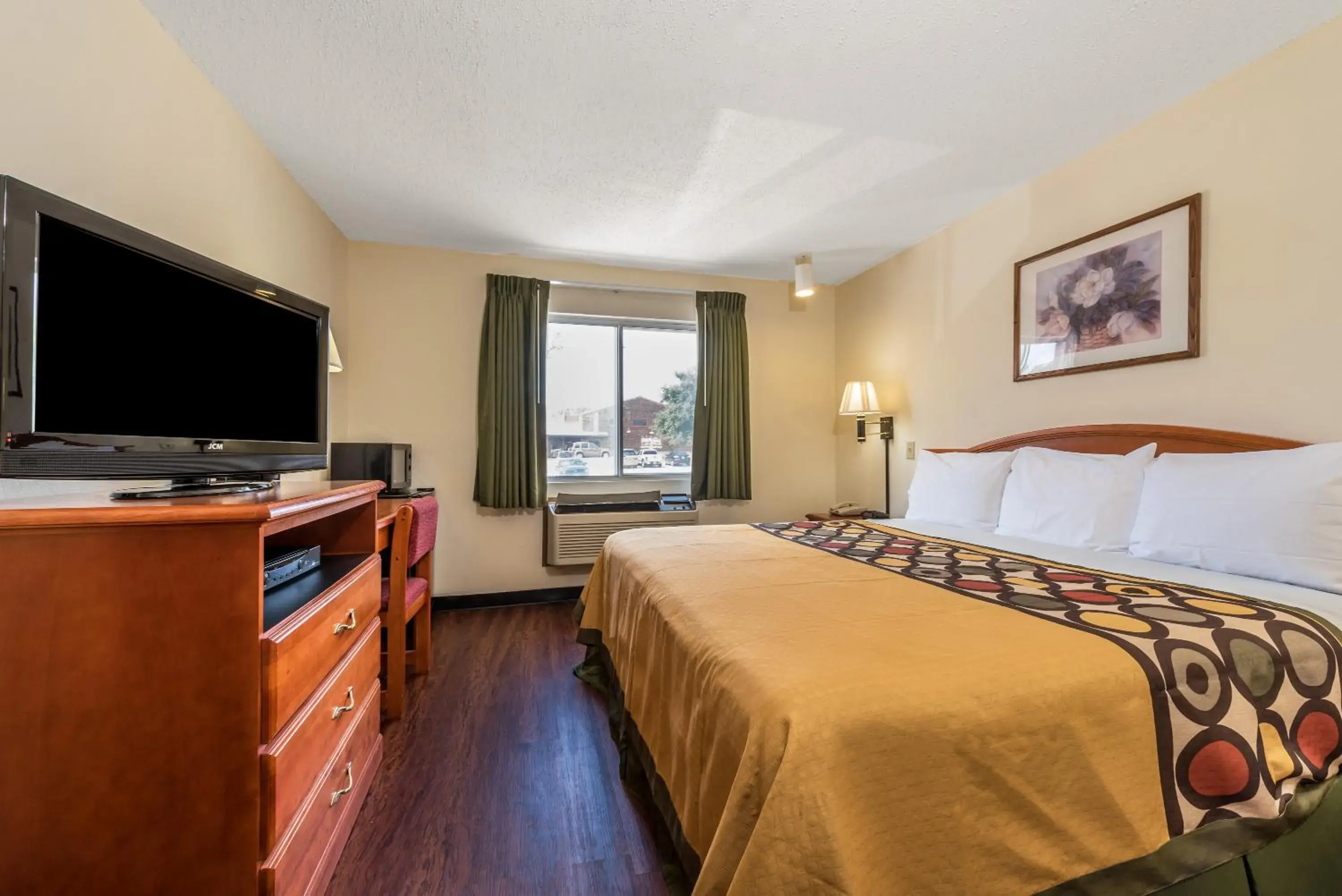 Bed, TV/Entertainment Center in Super 8 by Wyndham Denton