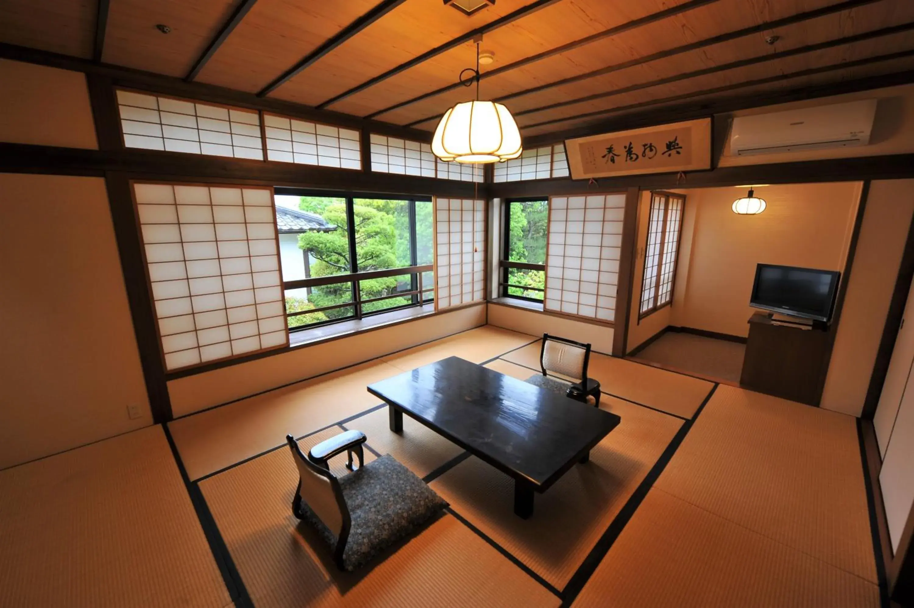Photo of the whole room, Seating Area in Haginoyado Tomoe Ryokan