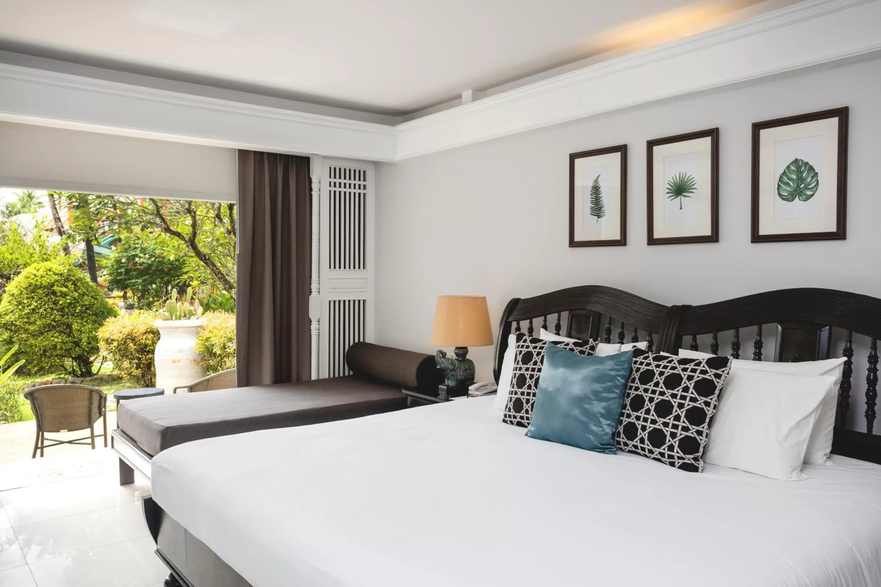 Bed in Thavorn Palm Beach Resort Phuket - SHA Extra Plus