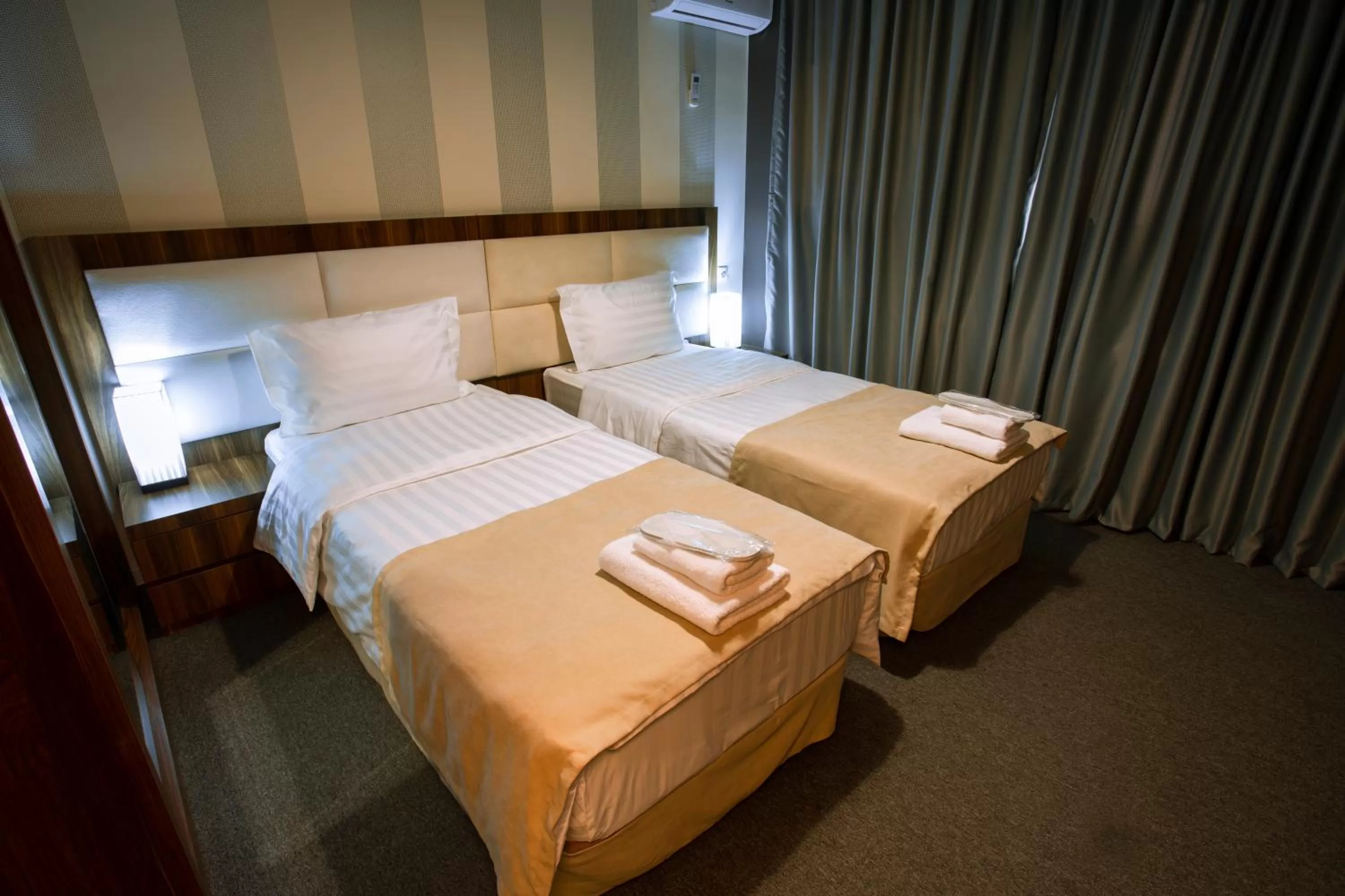 Bed in Apart Hotel West