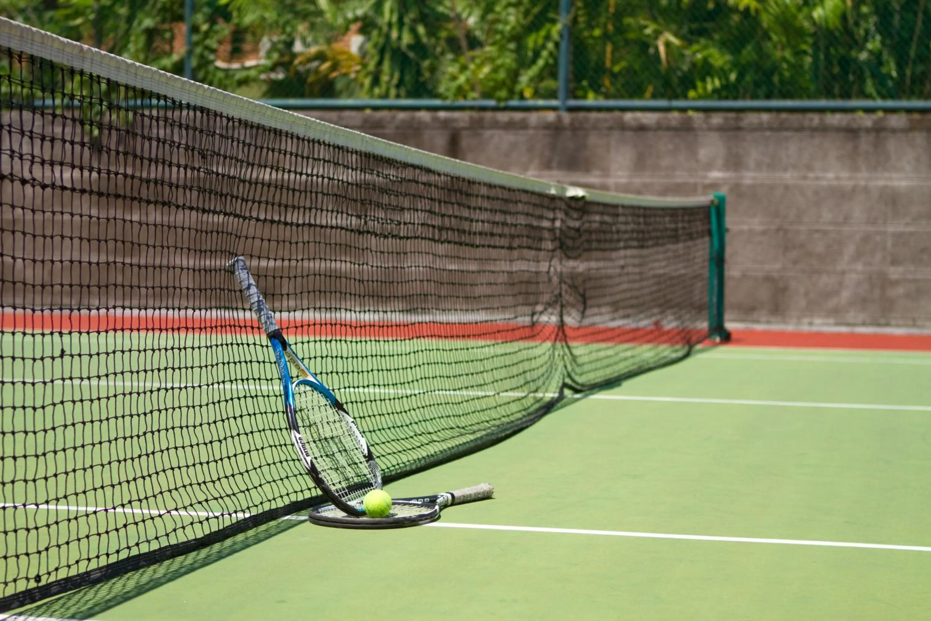 Tennis court in Rama Beach Resort and Villas