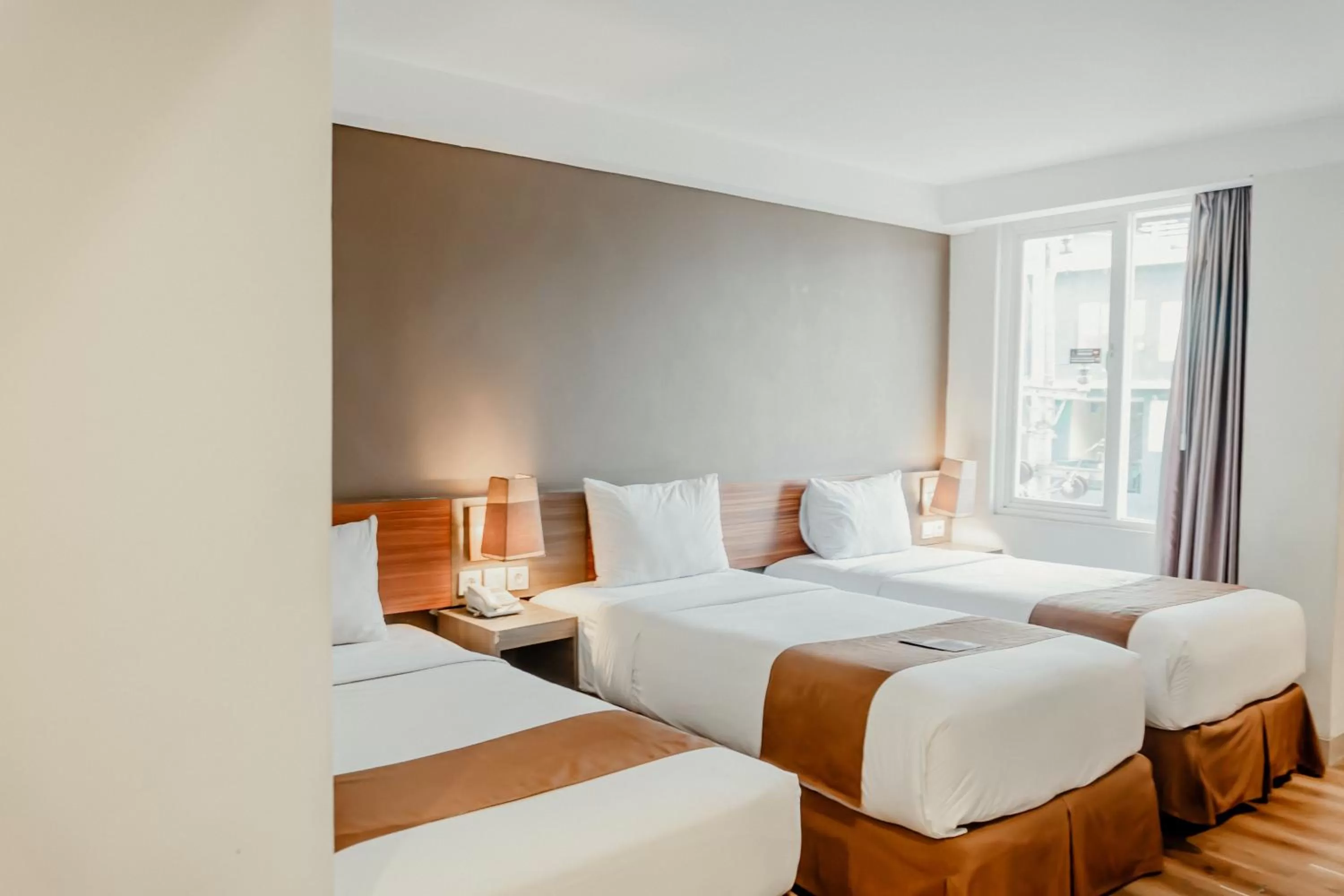 Bed in LAMORA Sagan Yogyakarta - formerly H Boutique Yogyakarta