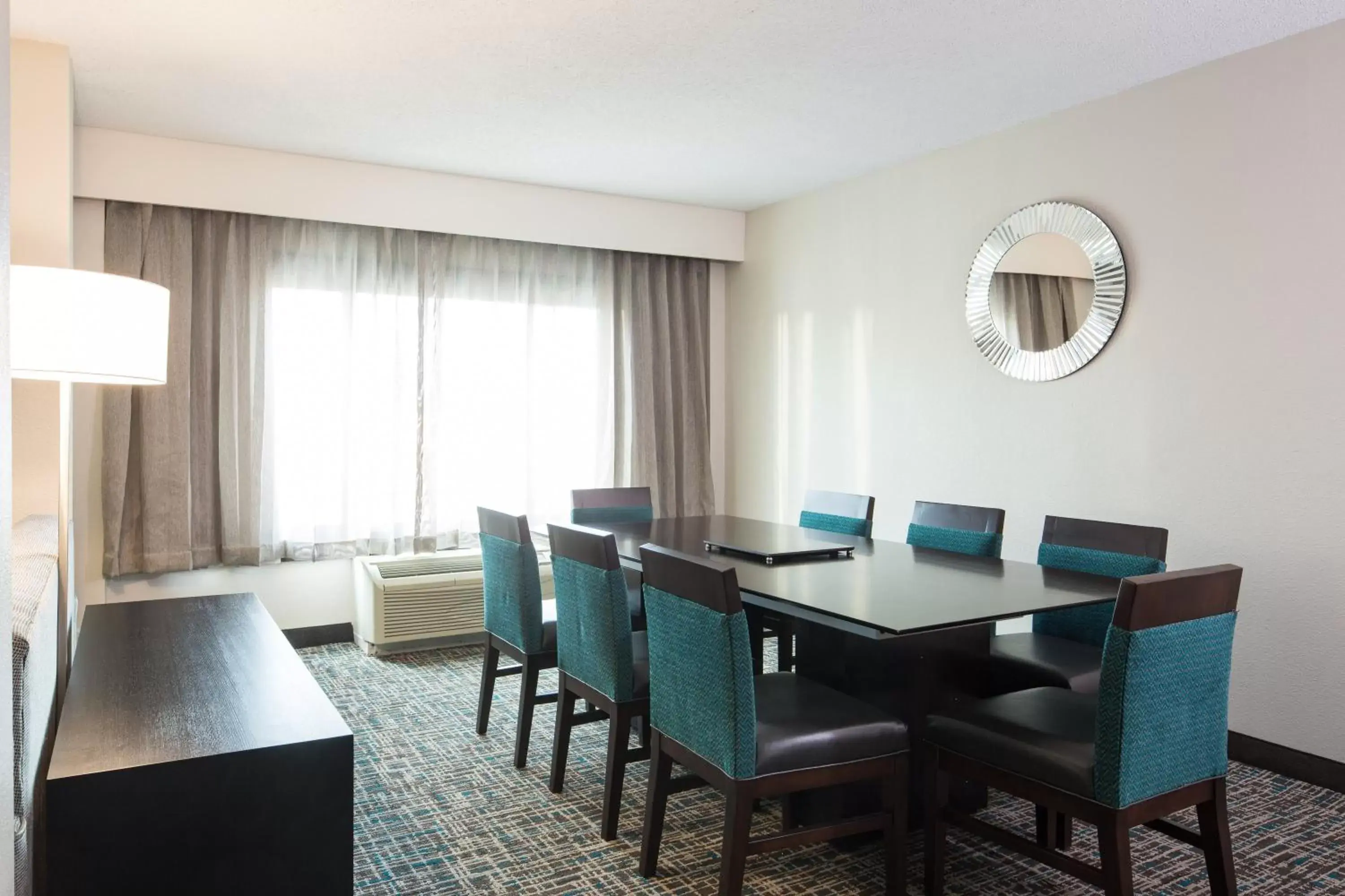 Bedroom, Dining Area in Crowne Plaza Memphis Downtown, an IHG Hotel