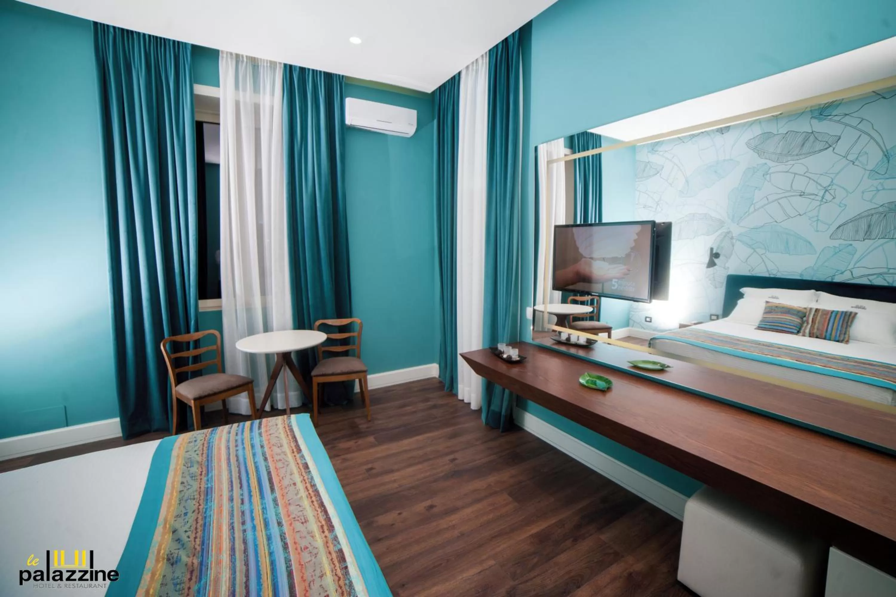 Bedroom in Le Palazzine Hotel