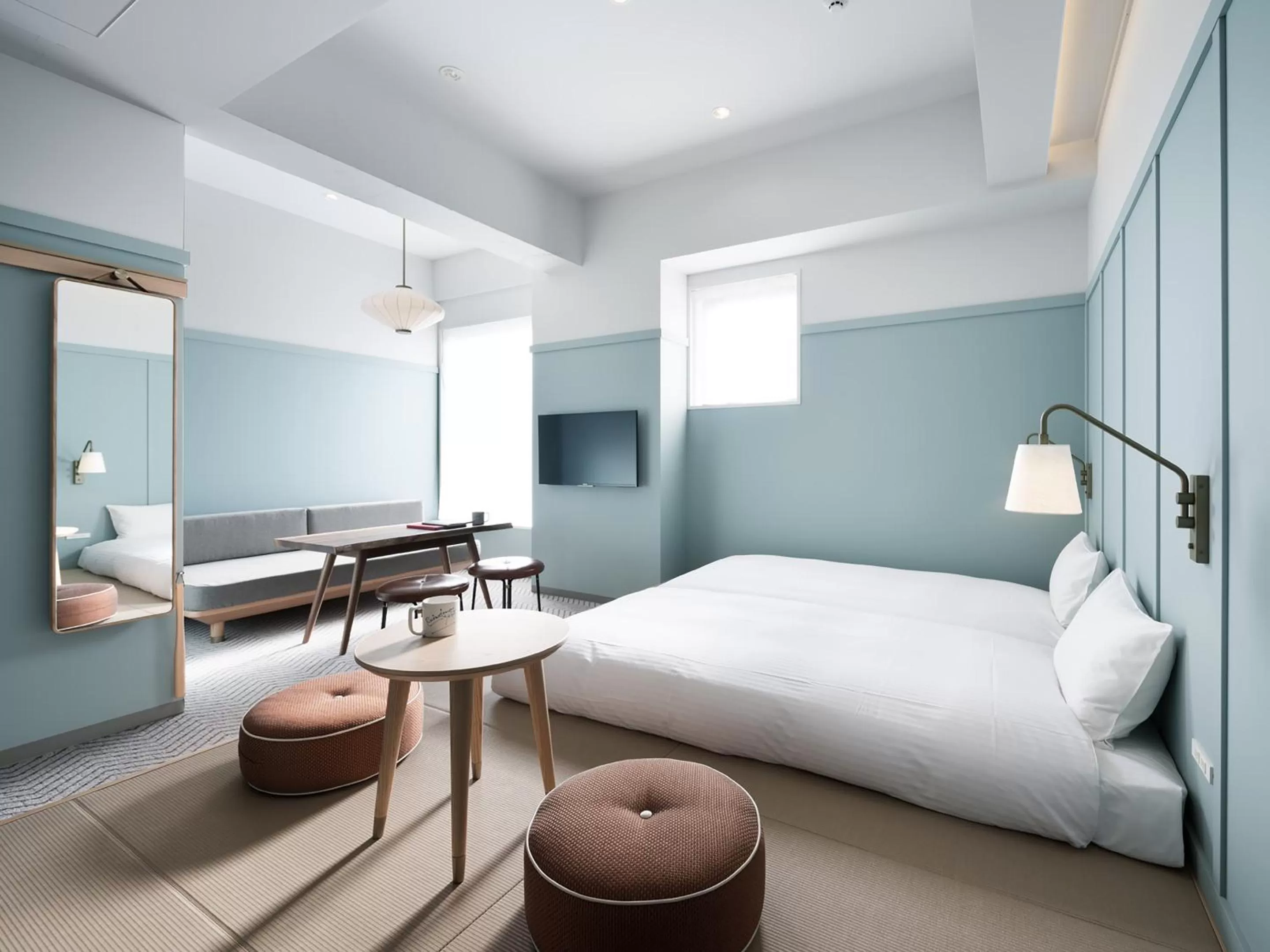 Photo of the whole room, Bed in RAKURO Kyoto by THE SHARE HOTELS