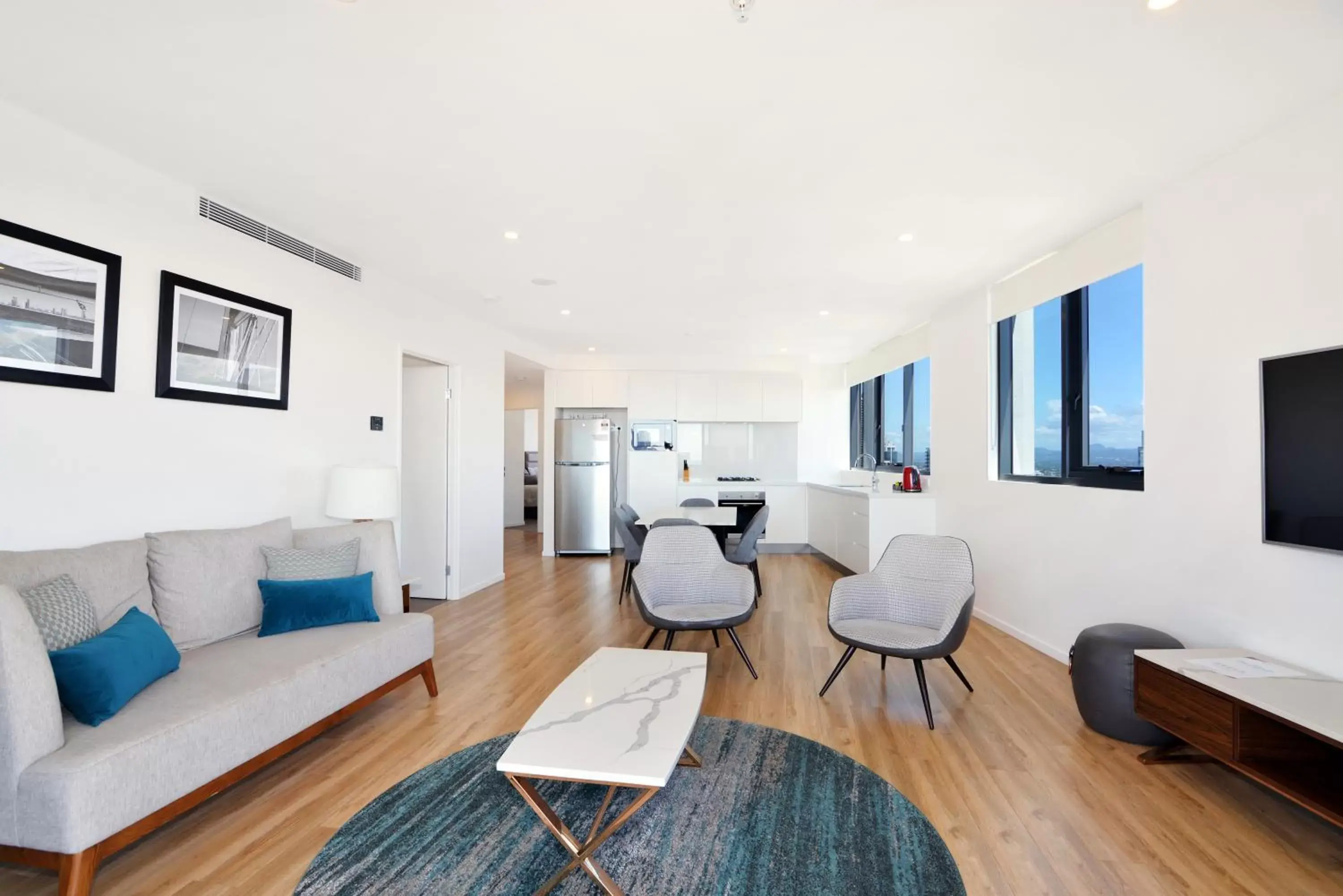 Living room, Seating Area in Ruby Gold Coast by CLLIX