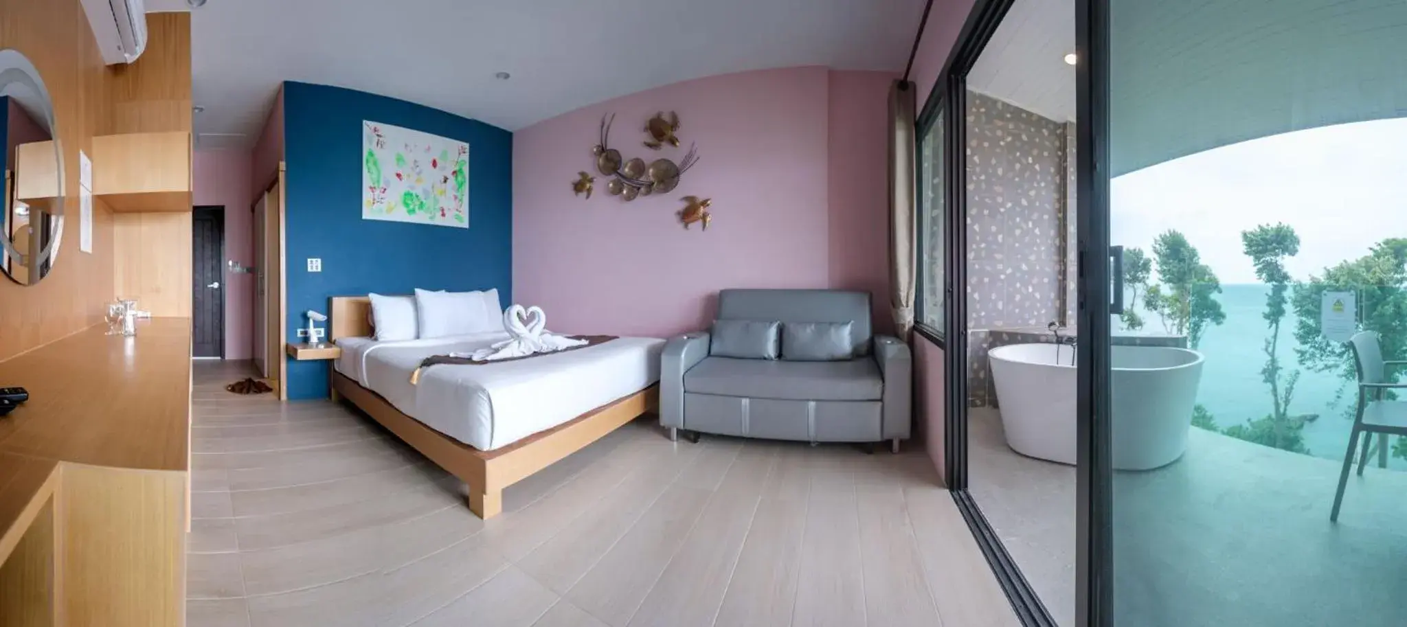 Bed, Seating Area in Cliff Lanta Suite-Koh Lanta Krabi