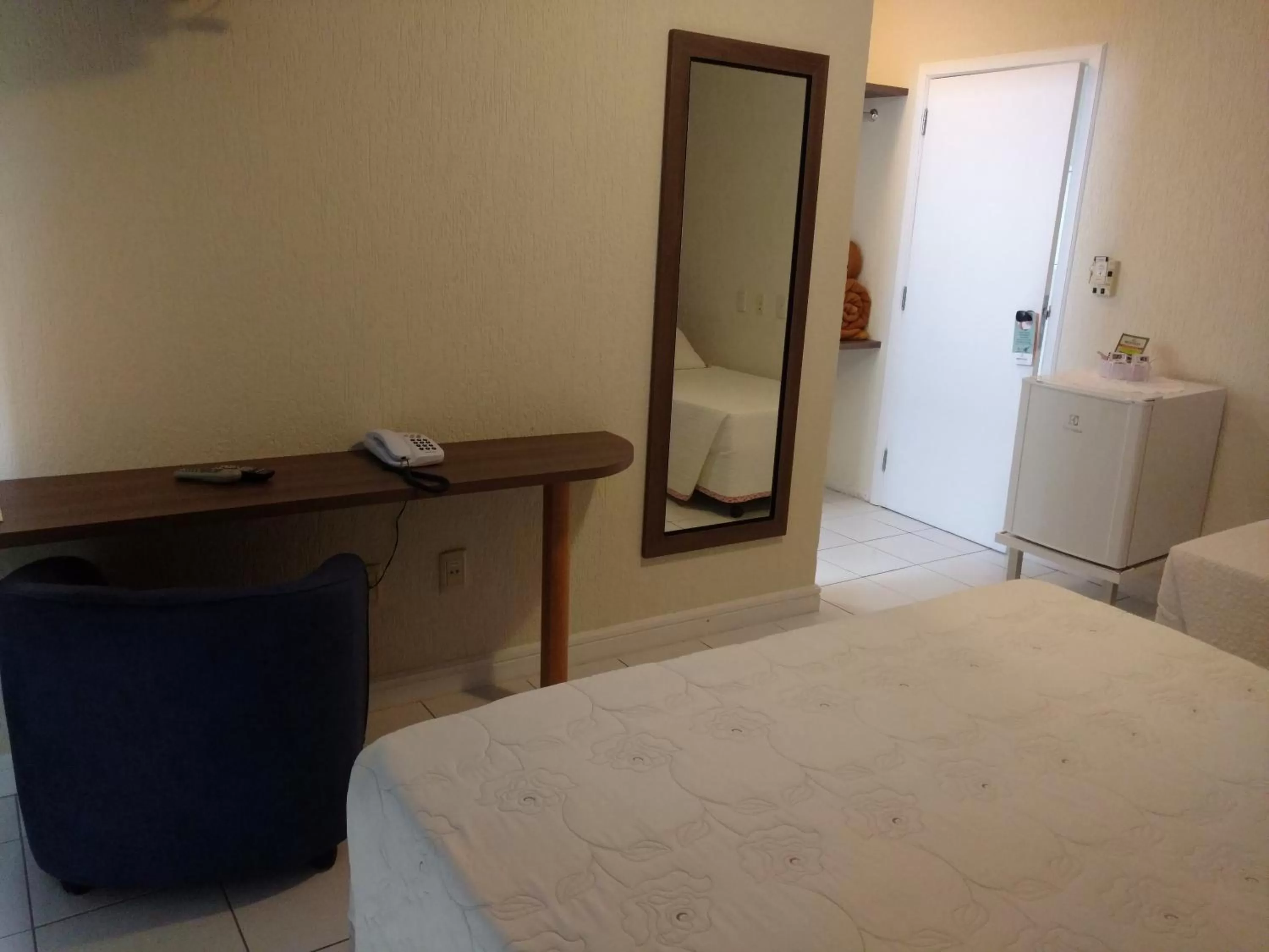 Bed in Brisamar Suite Hotel