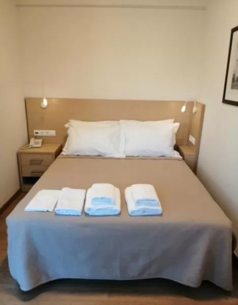 Bed in Gallery Suites & Residences Piraeus