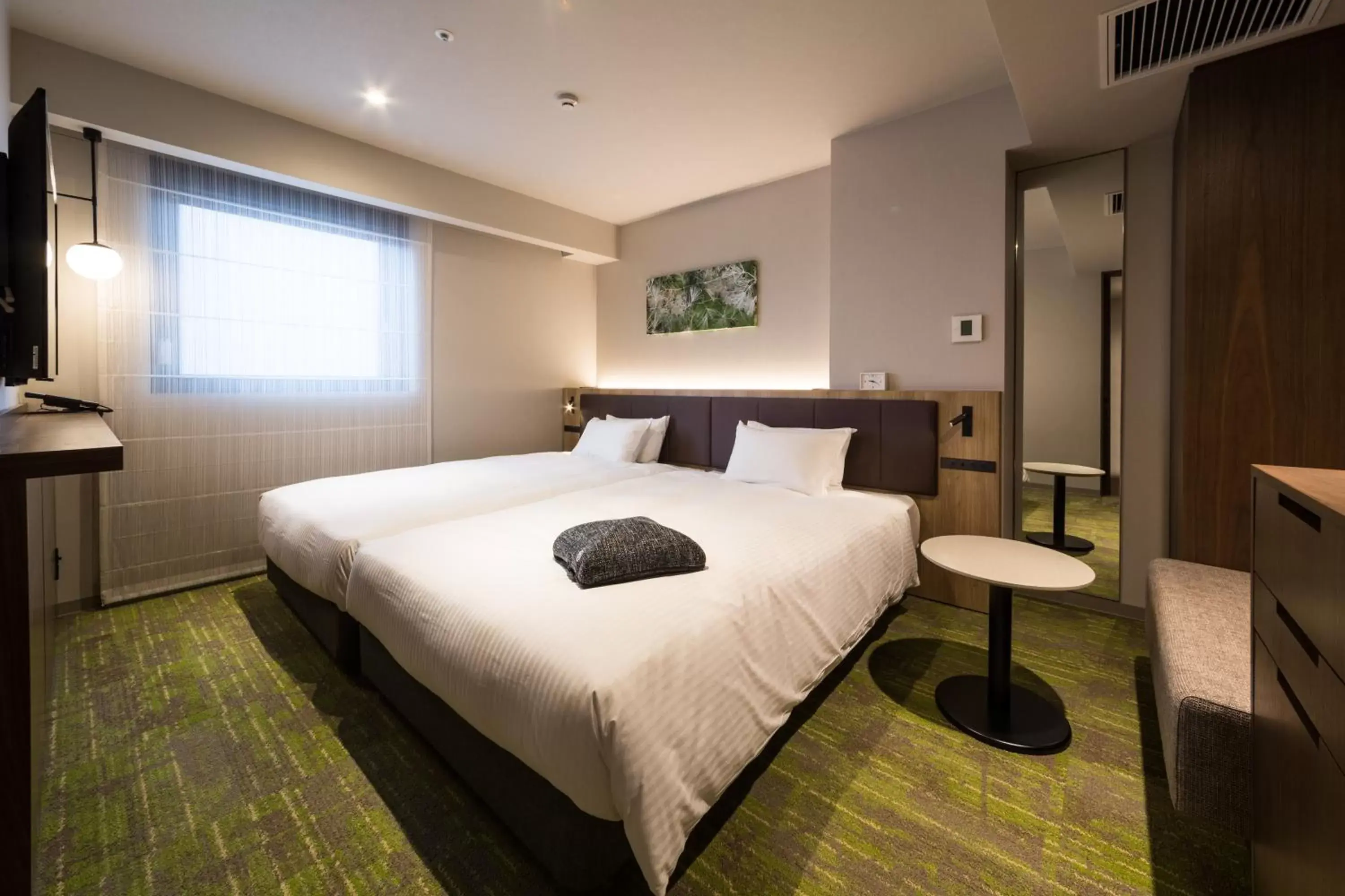 Bed in Hotel Forza Kanazawa