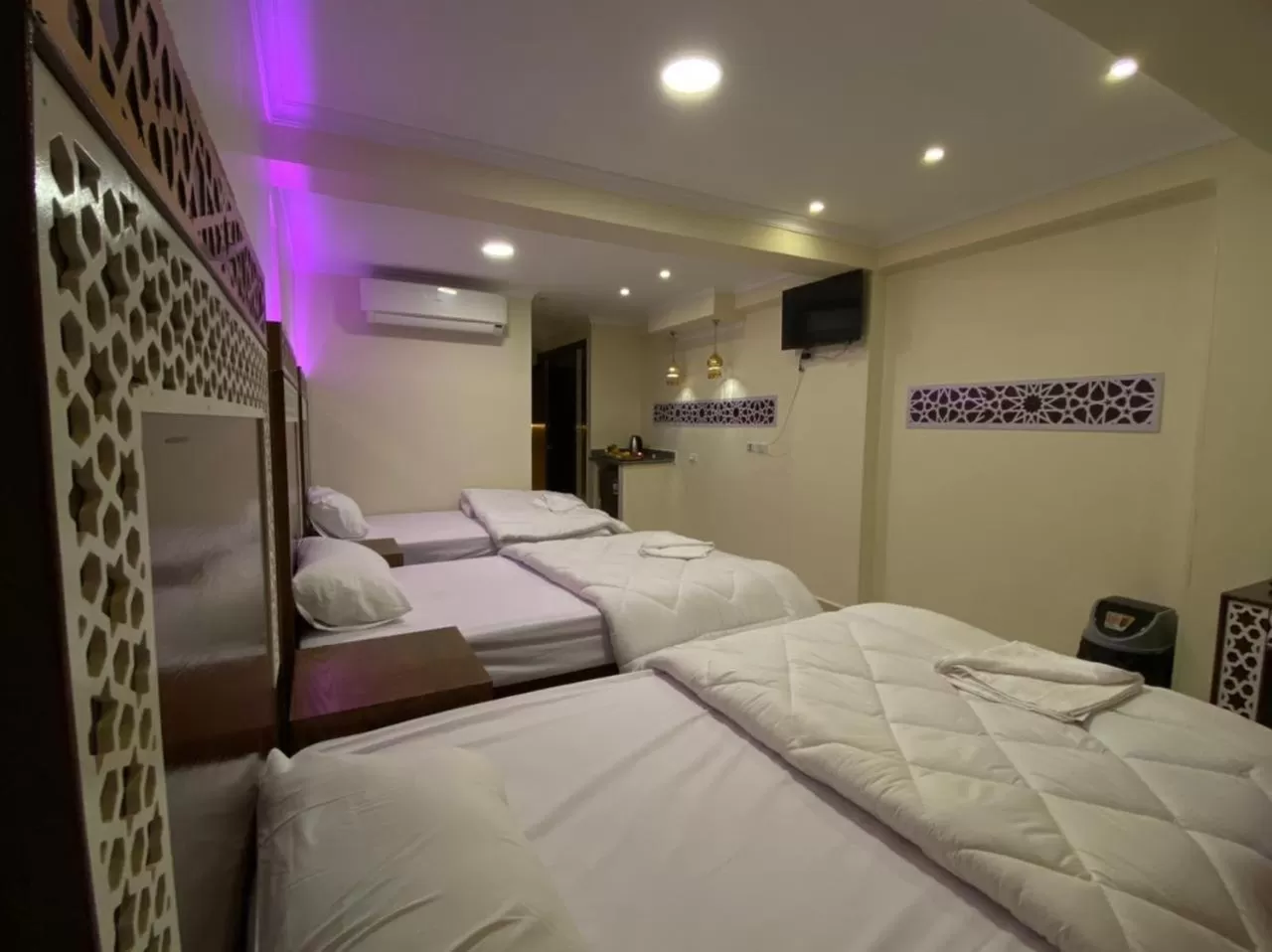 Bed in Pyramids Height Hotel & Pyramids Master Scene Rooftop