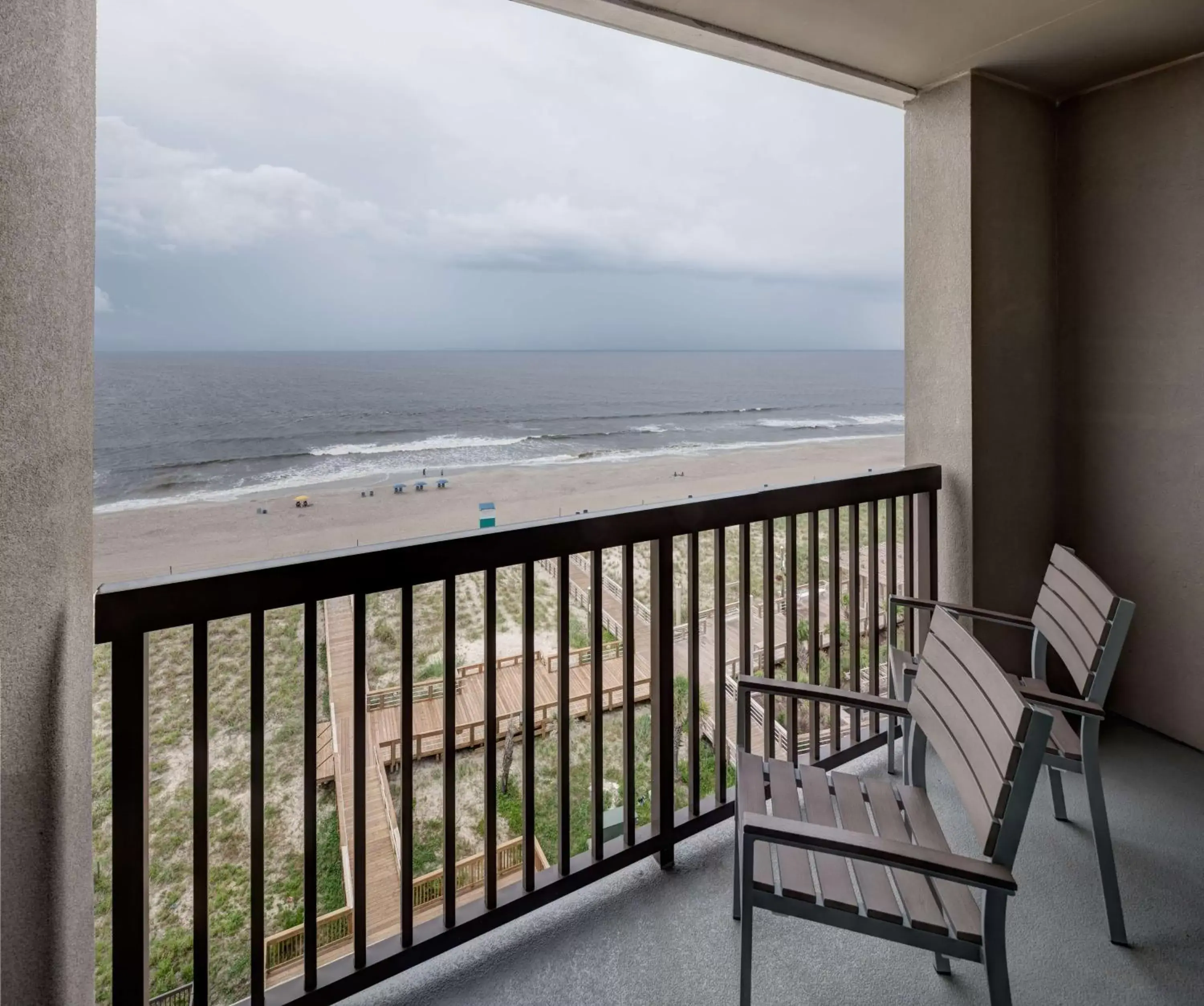 Bed in Hampton Inn & Suites by Hilton Carolina Beach Oceanfront