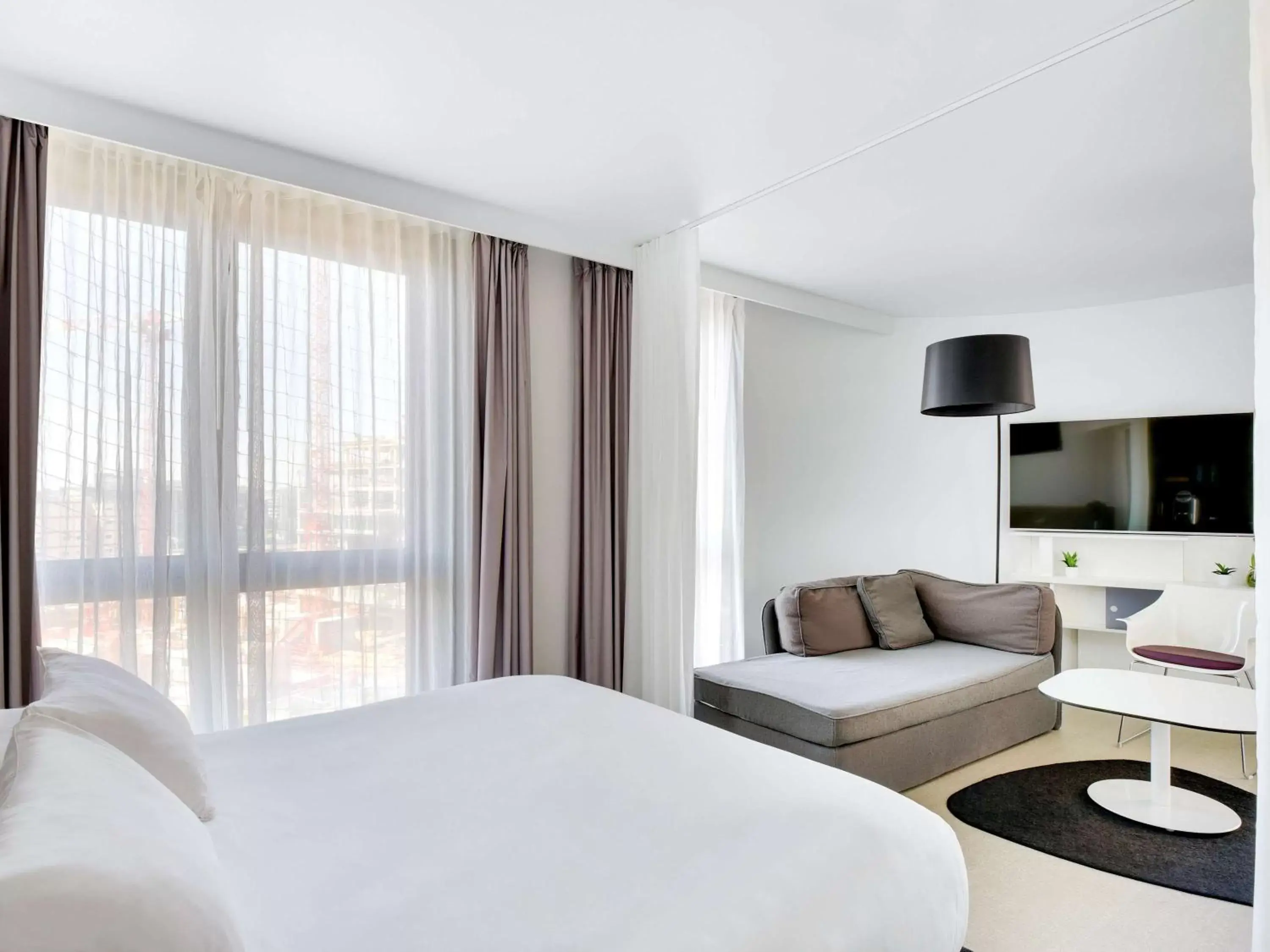 Upper Suite with One Double Bed and One Single Bed - Terrace in Novotel Suites Paris Issy Les Moulineaux Upper Suite with One Double Bed and One Single Bed - Terrace in Novotel Suites Paris Issy Les Moulineaux