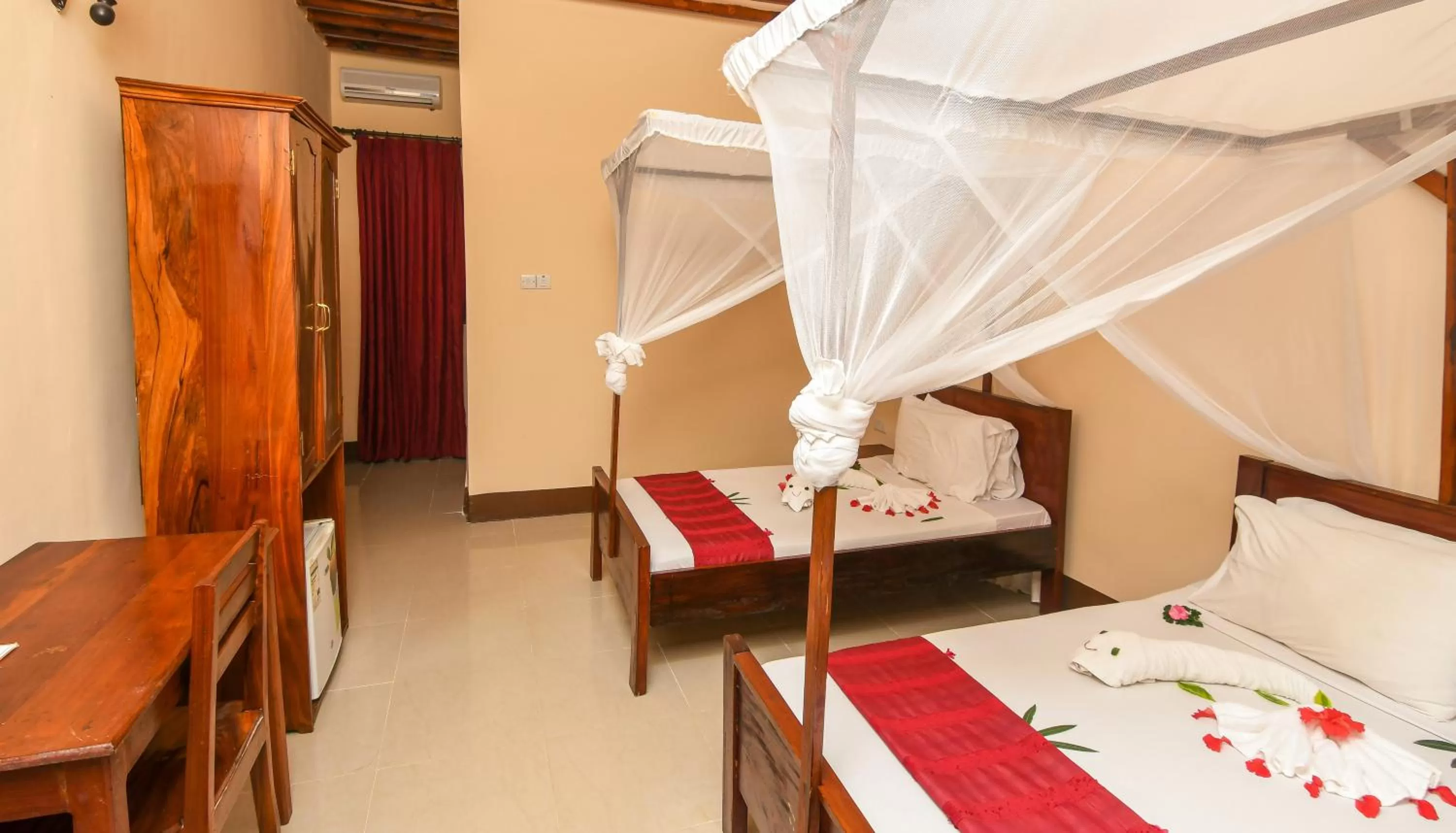 Bed in Amaan Beach Bungalows