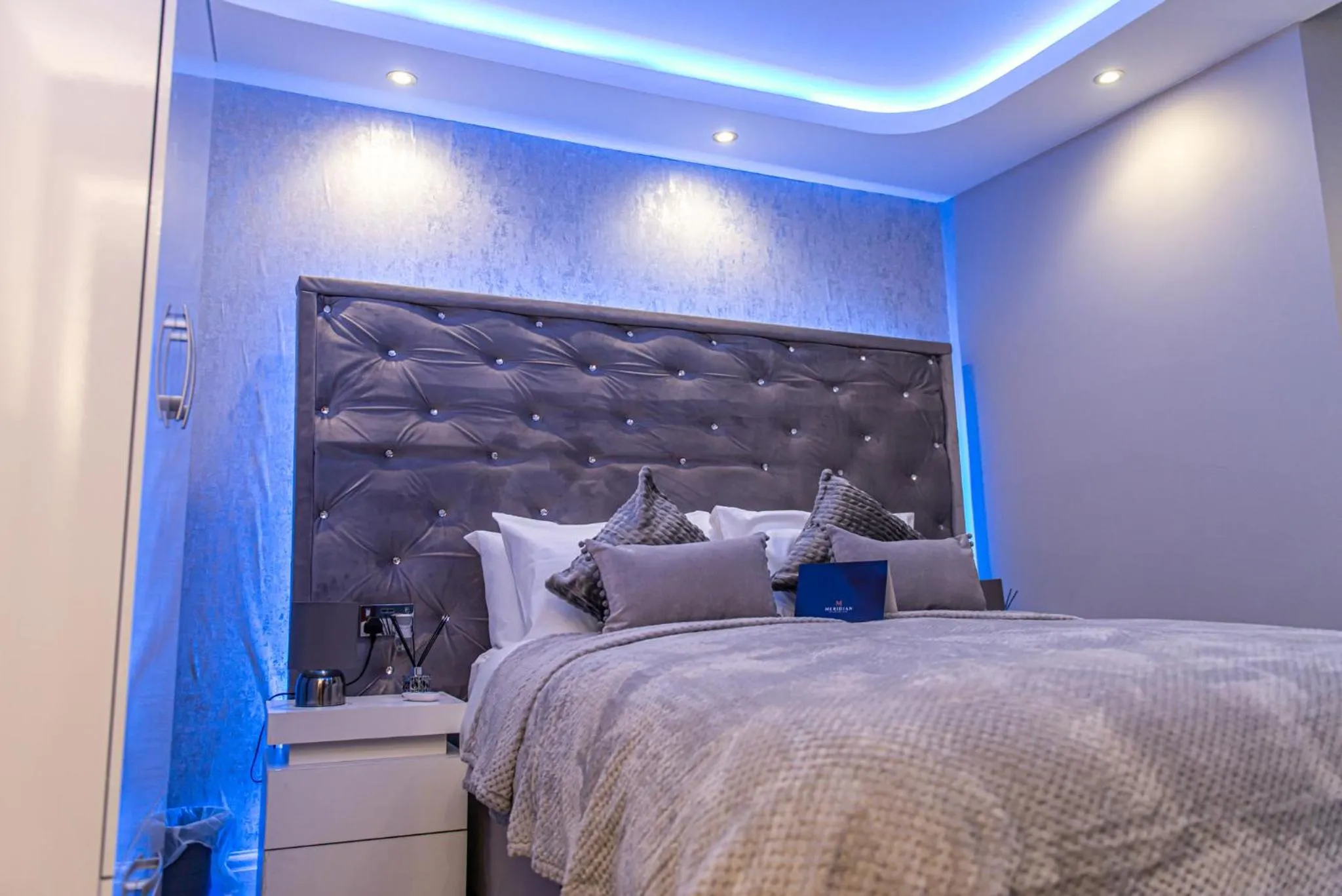 Bed in Meridian Serviced Apartments