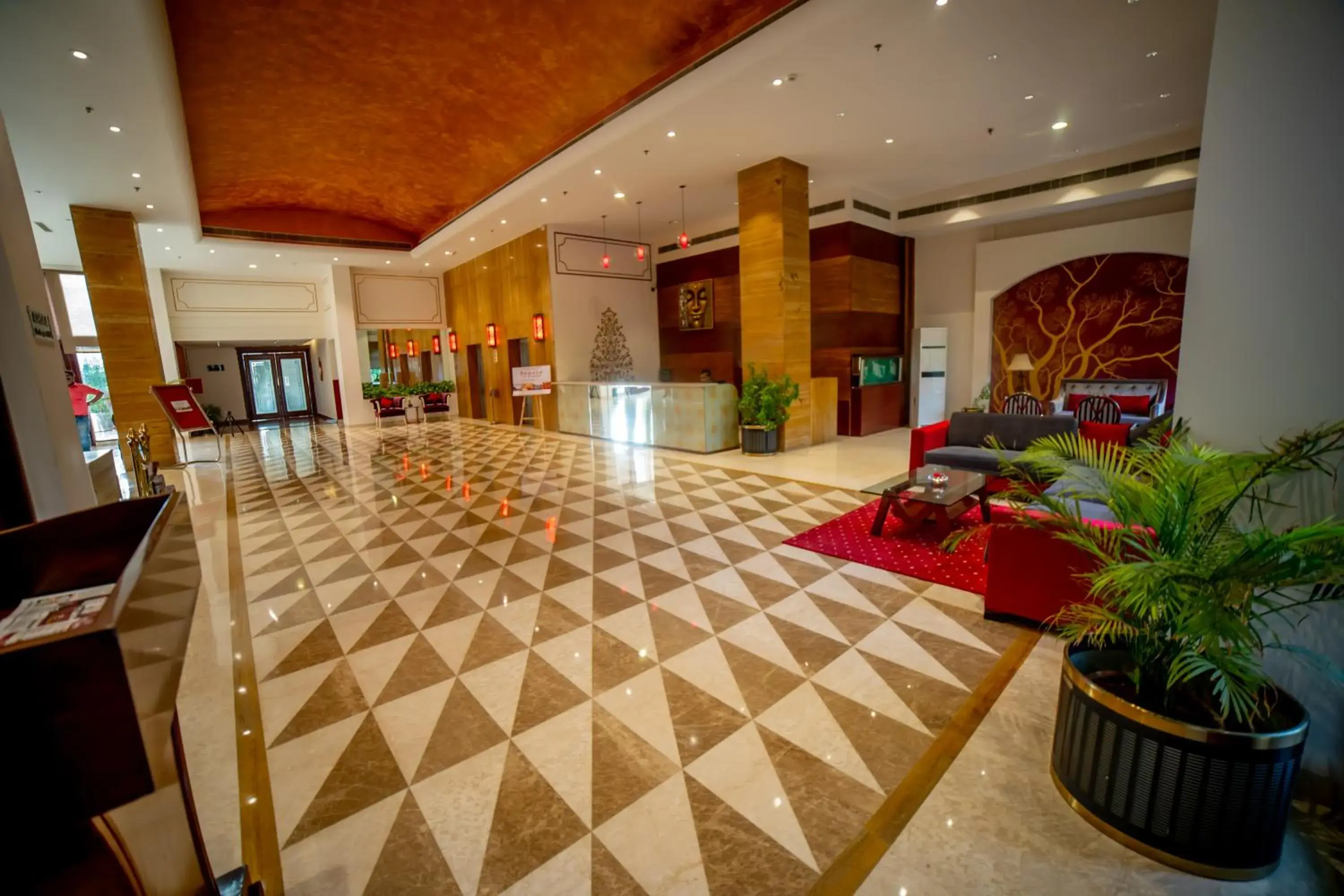 Lobby or reception in Ramada by Wyndham Jaipur Jaisinghpura Lobby or reception in Ramada by Wyndham Jaipur Jaisinghpura