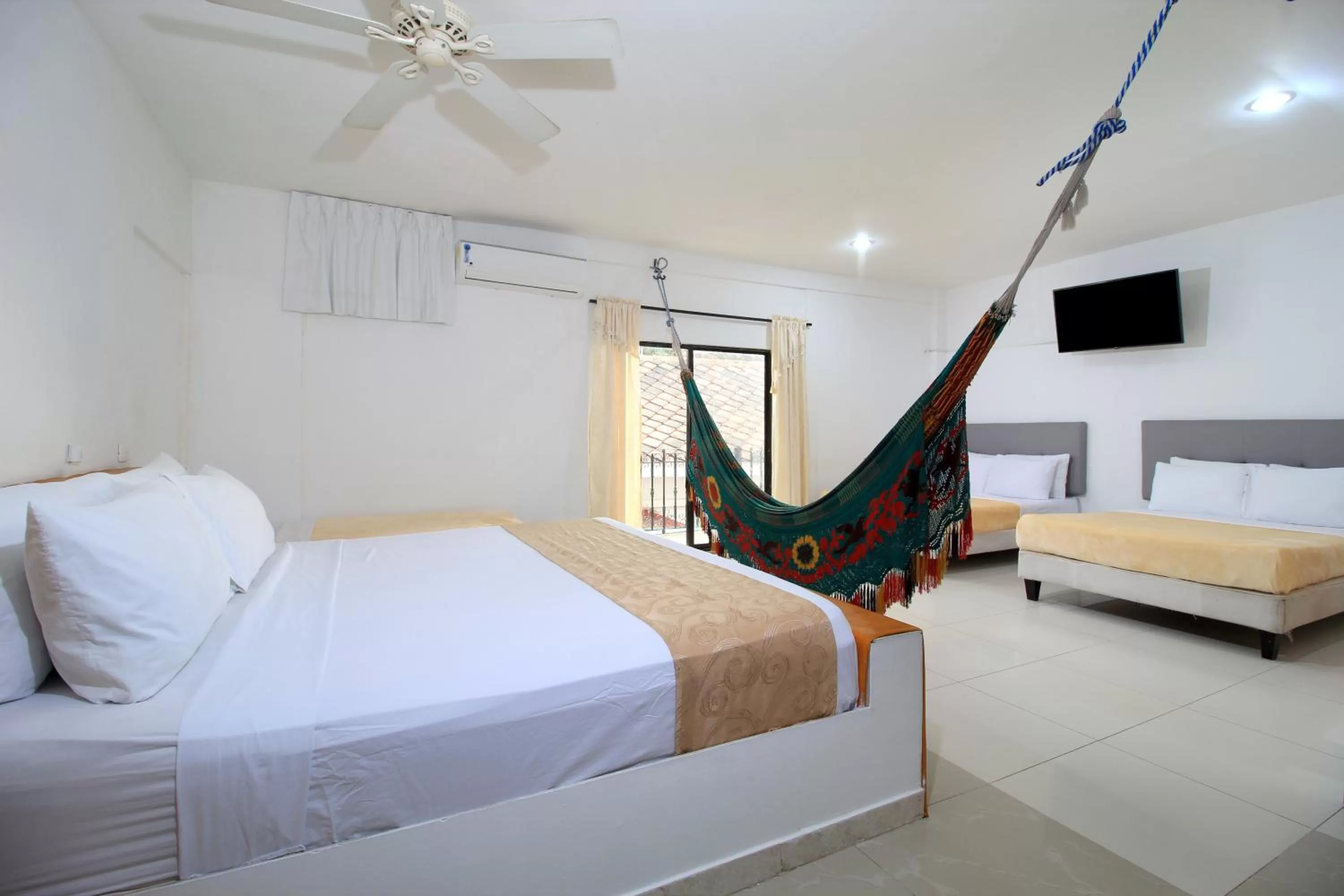 Bed in Hotel Abi Inn By GEH Suites