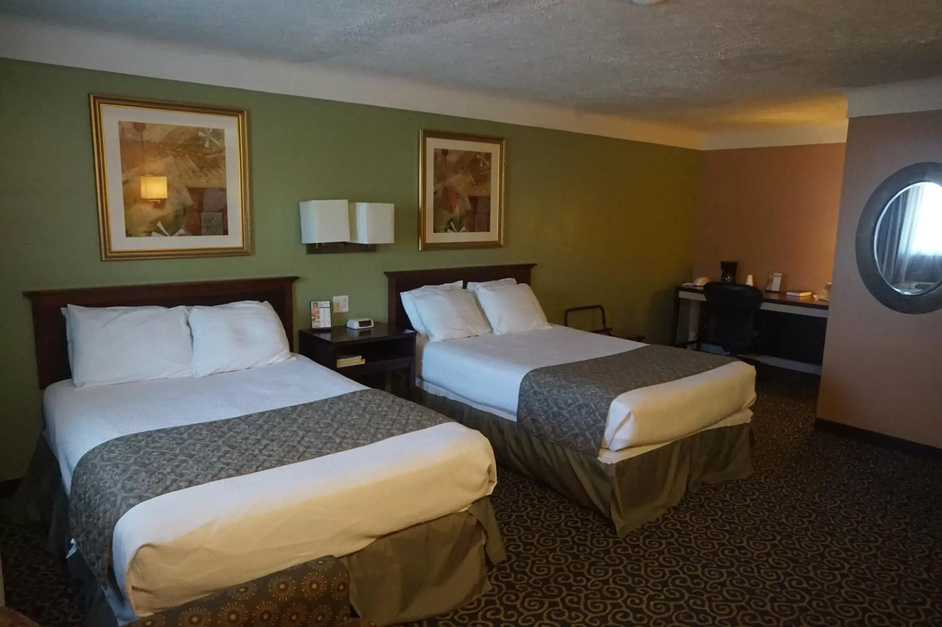 Bed in Bellevue Hotel and Suites