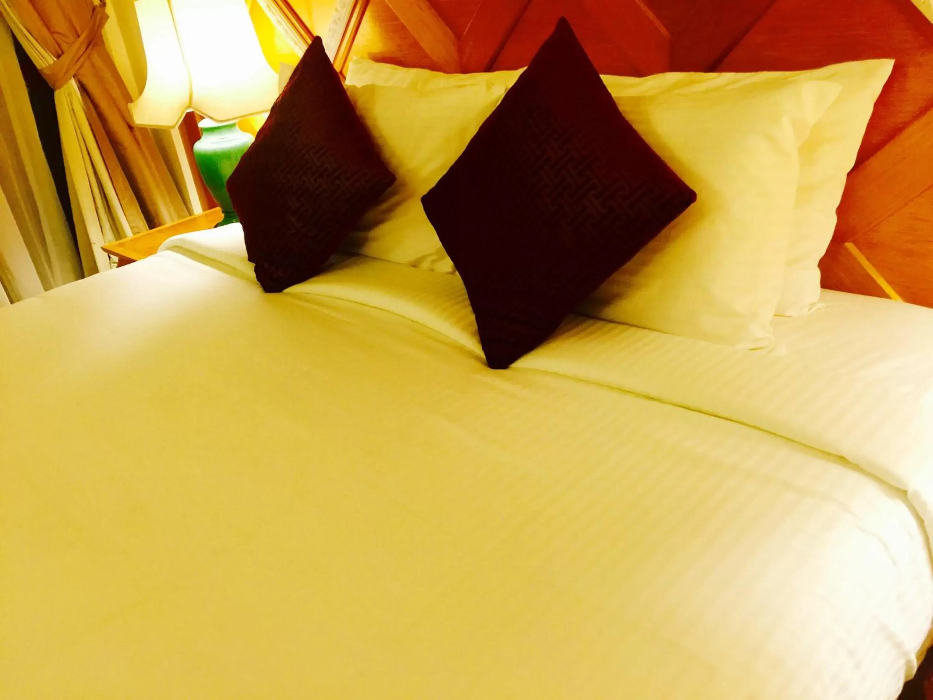 Bed in Langkawi Lagoon Beach Resort