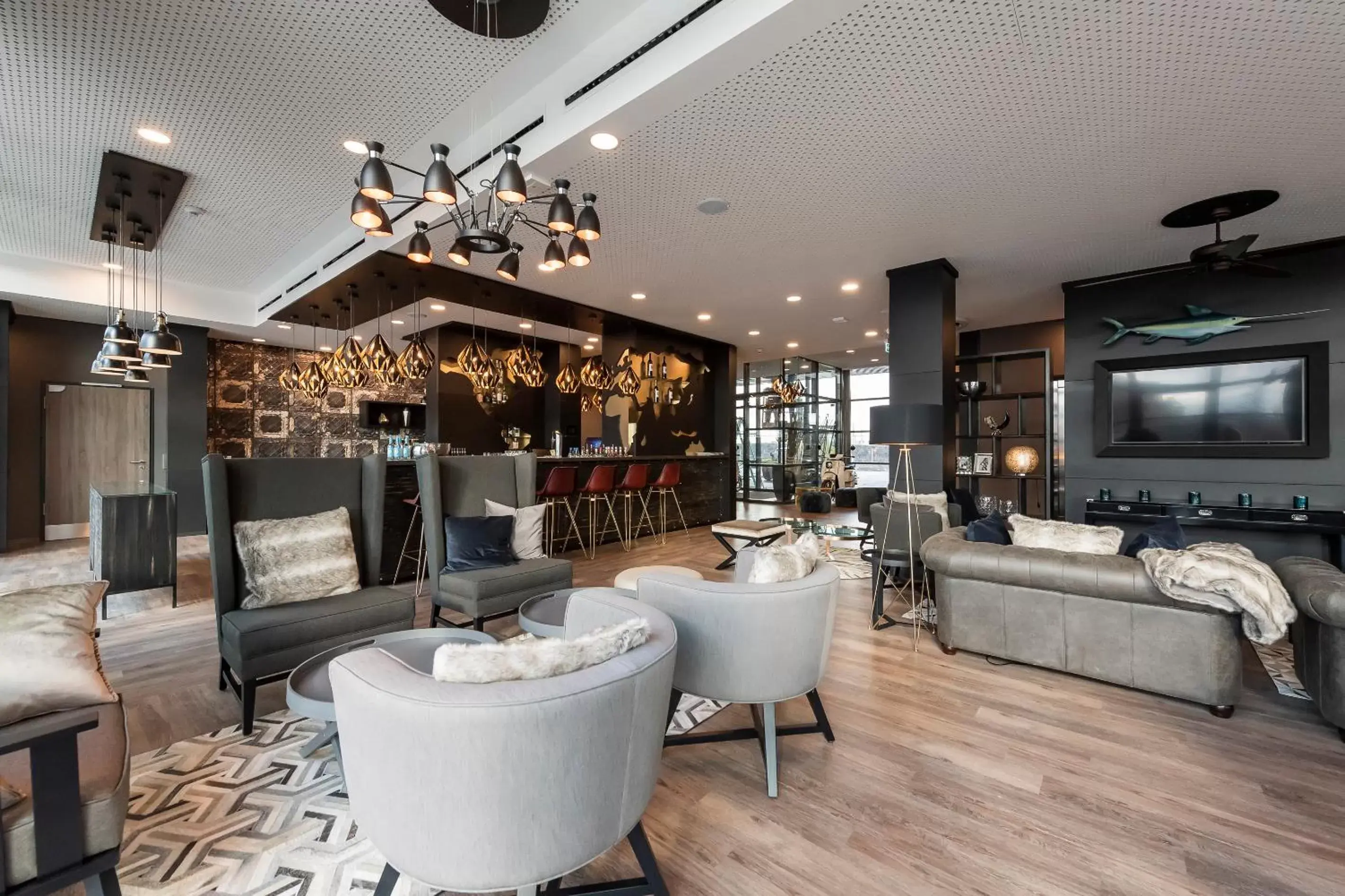 Lounge or bar in HARBR Hotel Heilbronn, a member of Radisson Individuals Lounge or bar in HARBR Hotel Heilbronn, a member of Radisson Individuals