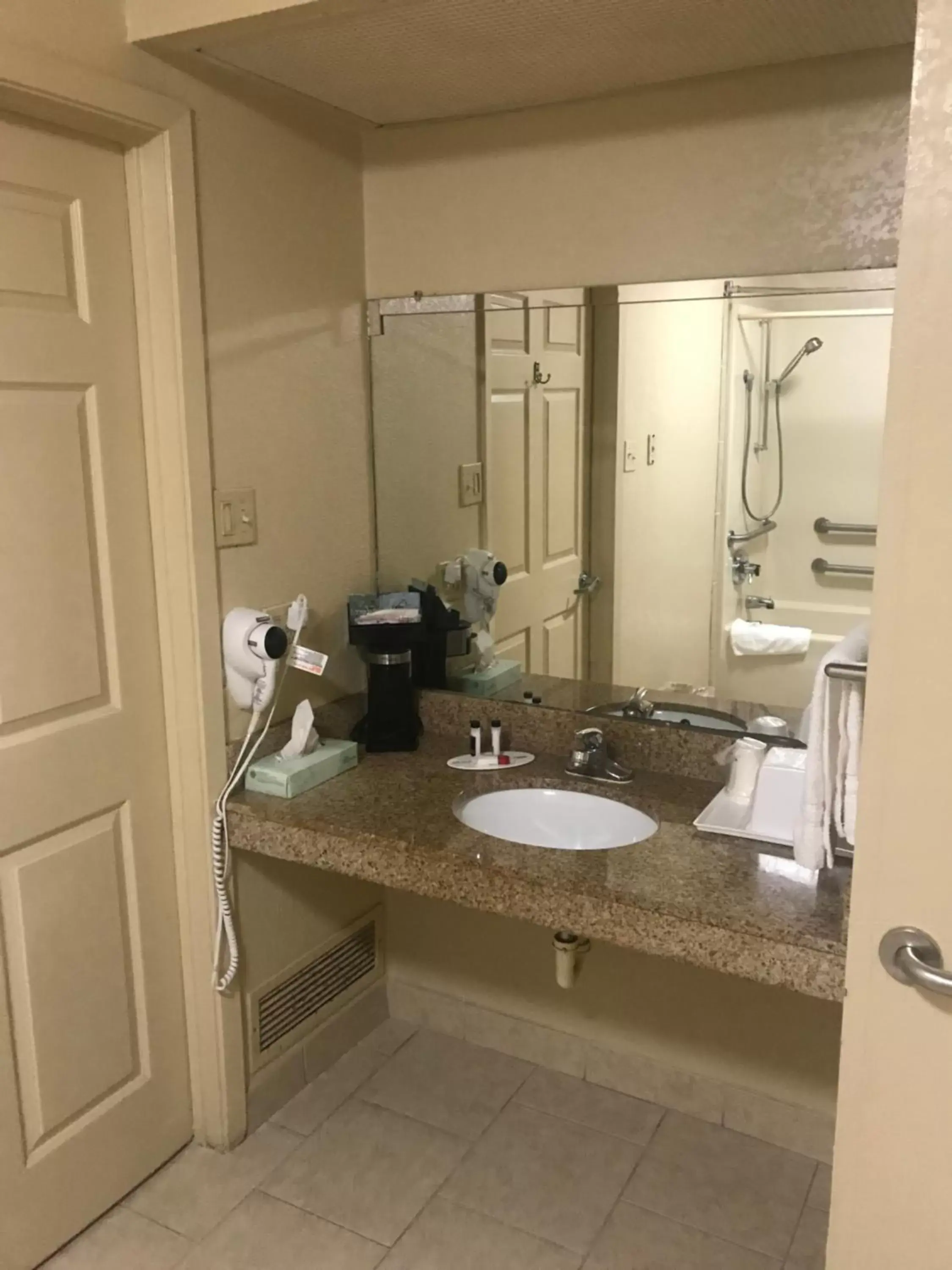 Bathroom in Super 8 by Wyndham Monroe