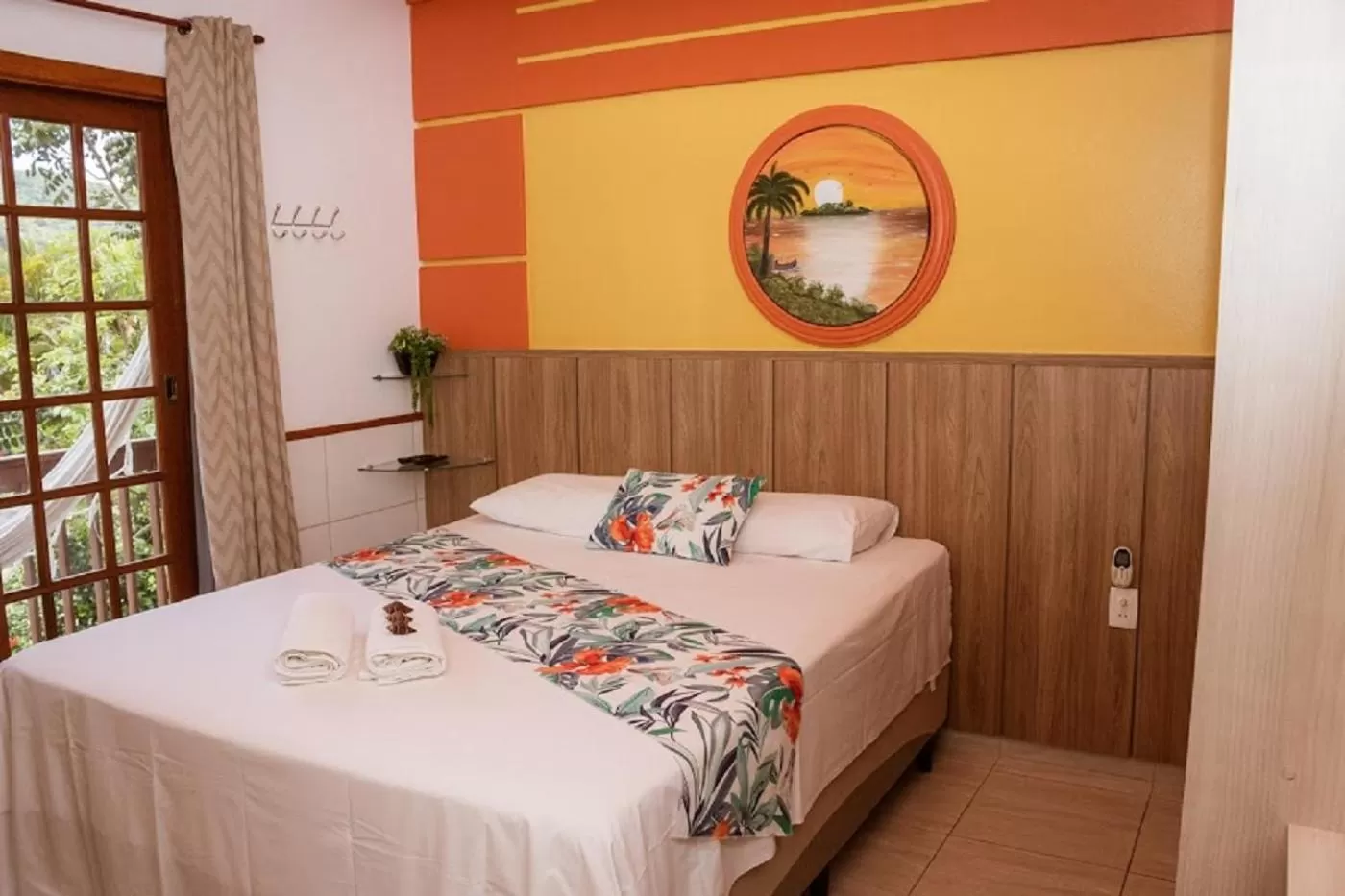 Photo of the whole room, Bed in Pousada Arquipélago