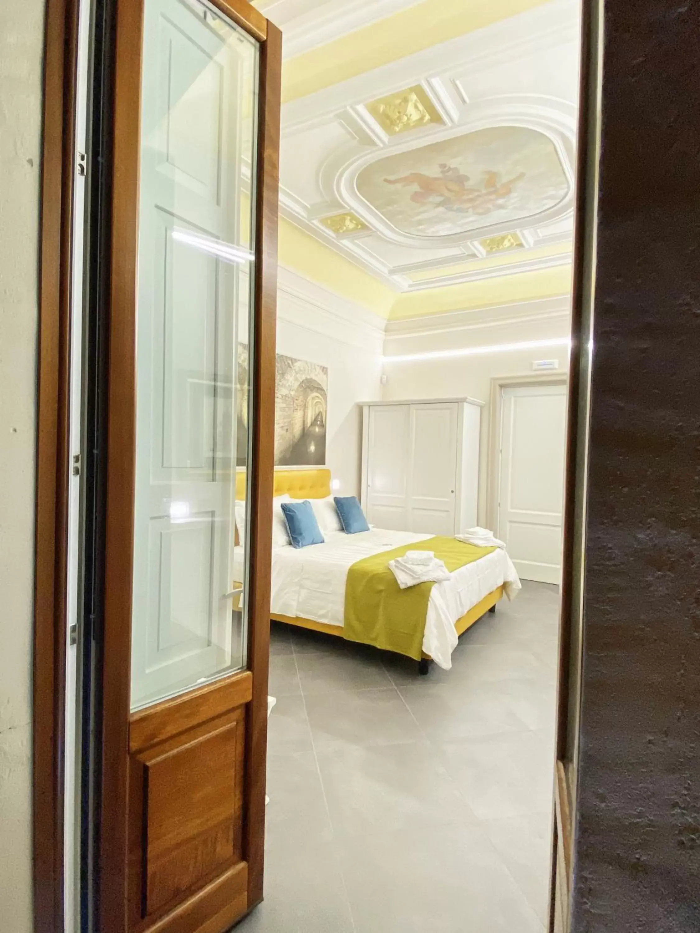 Bed in ANFITEATRO LE SUITES