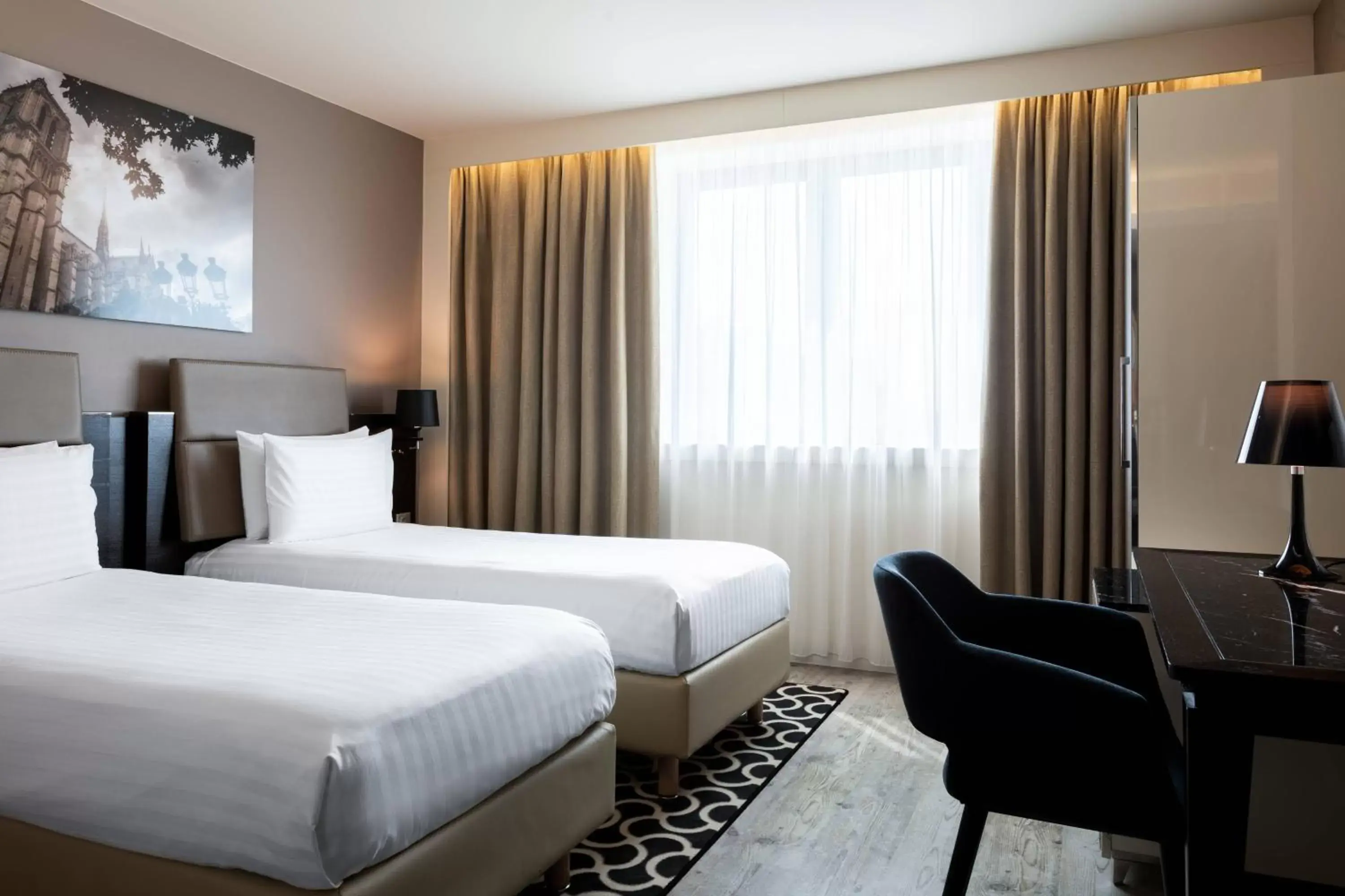 Photo of the whole room, Bed in AC Hotel Paris Porte Maillot by Marriott