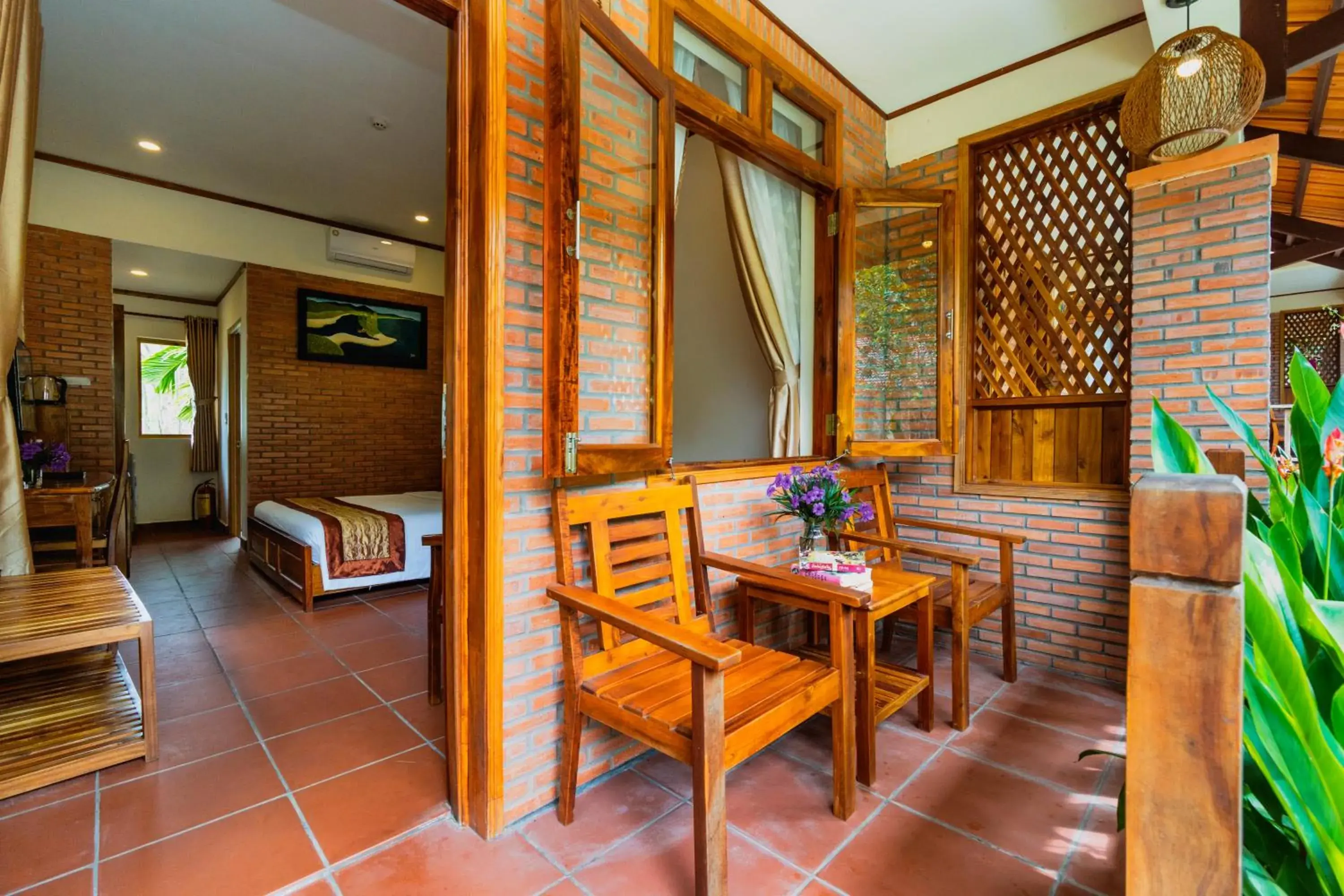 Bedroom, Seating Area in The Garden House Phu Quoc Resort