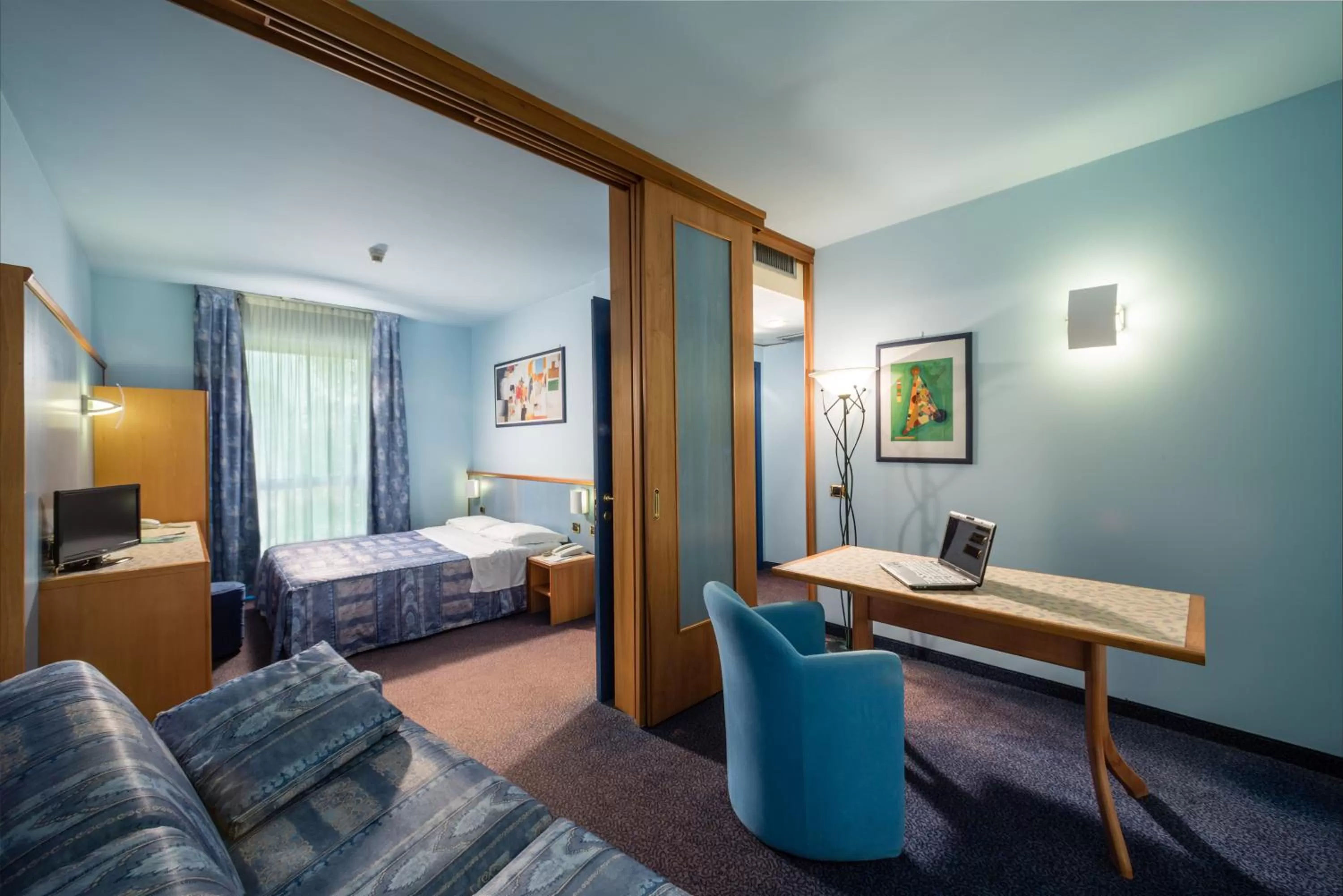 Living room, Bed in Hotel & Loisir Le Ruote