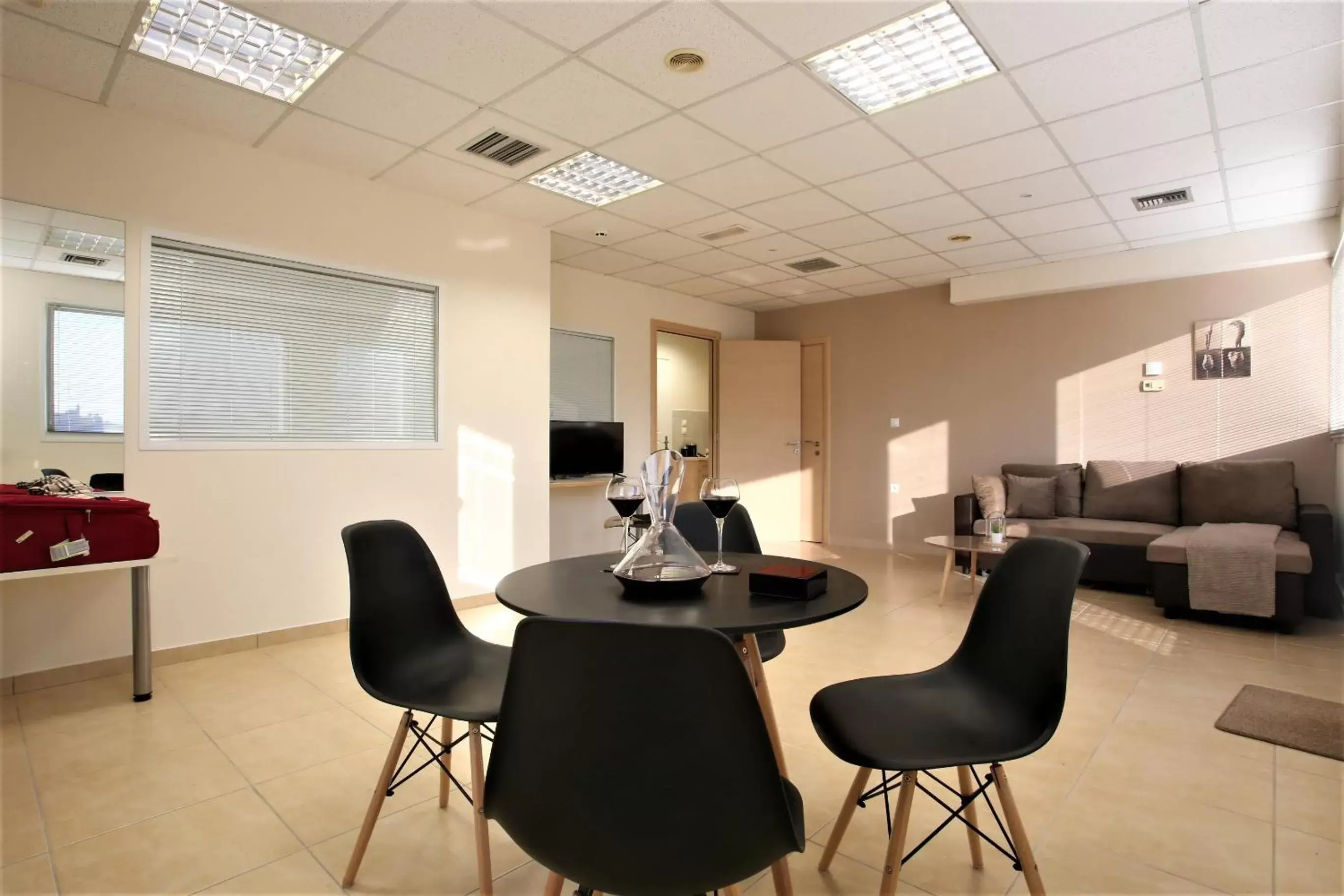 Living room, Dining Area in GK Airport Suites