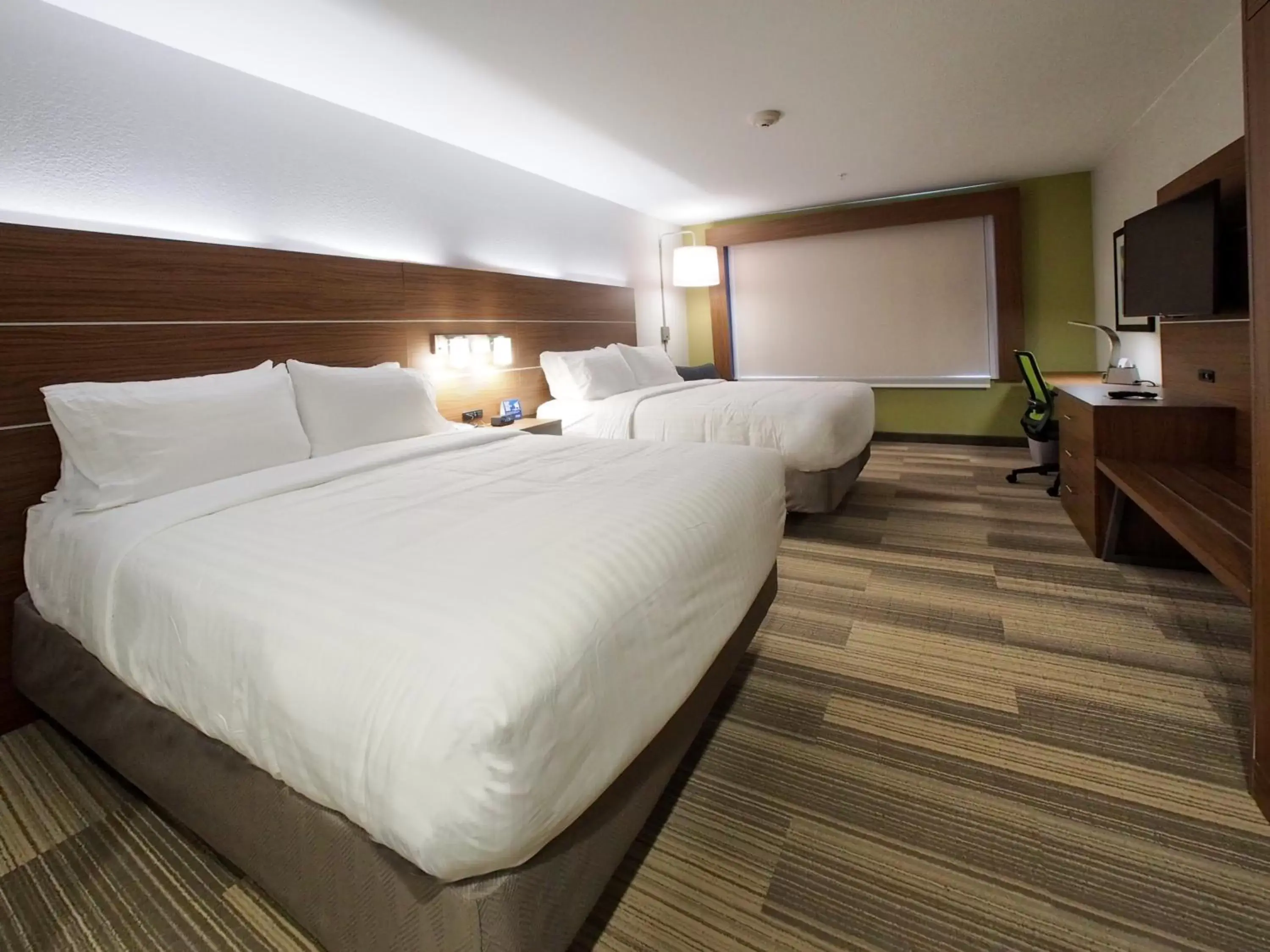 Bed in Holiday Inn Express & Suites Moore, an IHG Hotel